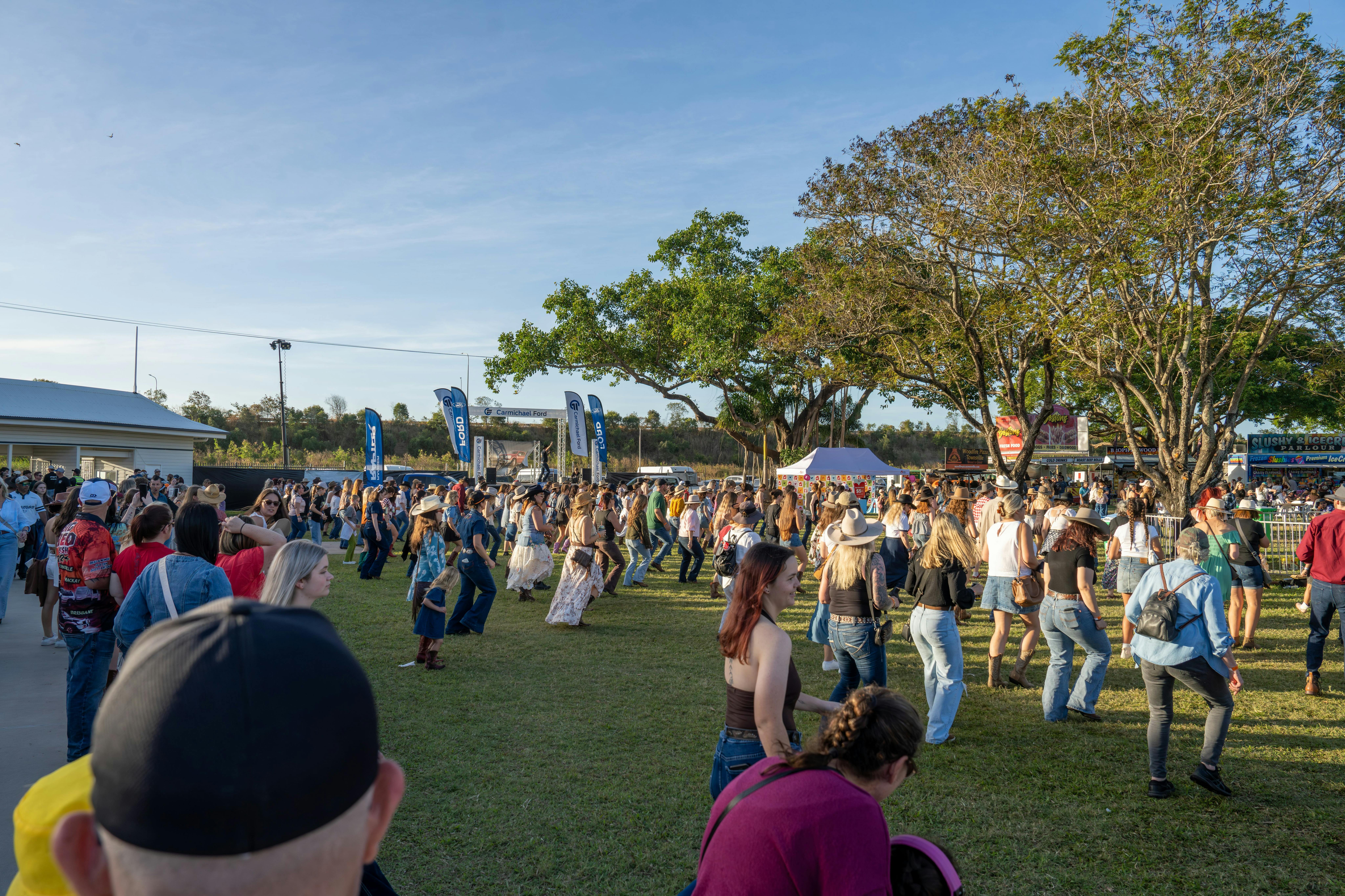 Guest take part in line dancing throughout the festival