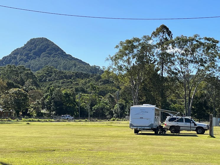 Mt Chincogan, lawn area and caravan being towed into place