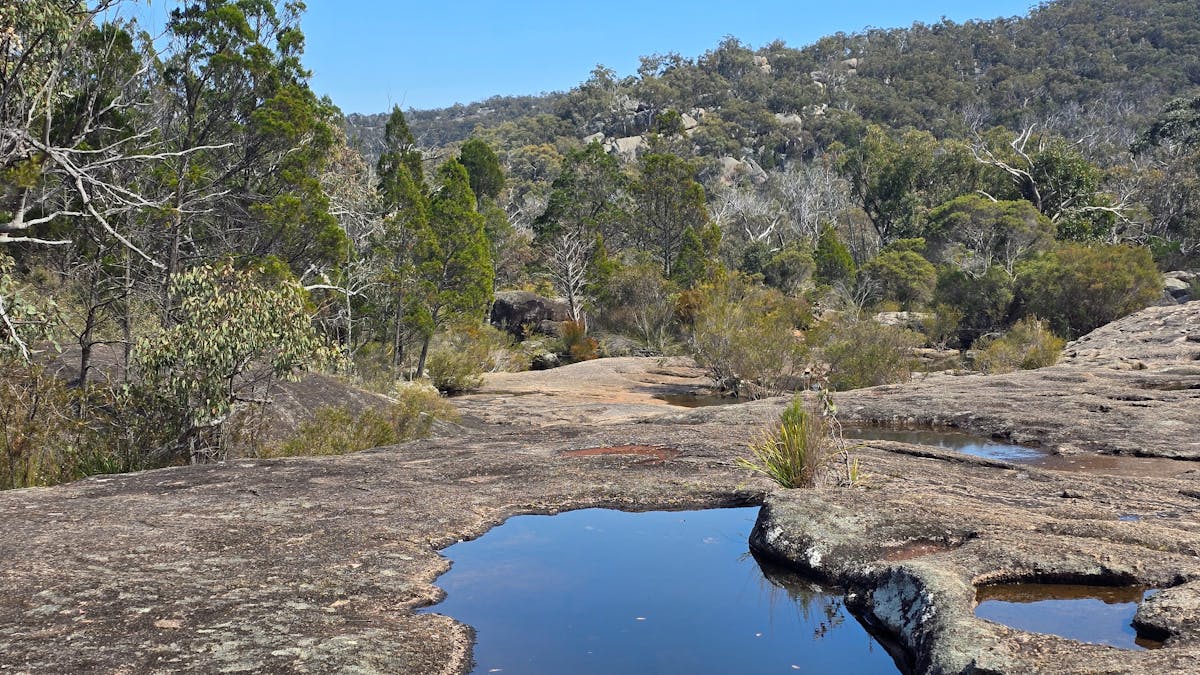 Waterhole in rocky landscape