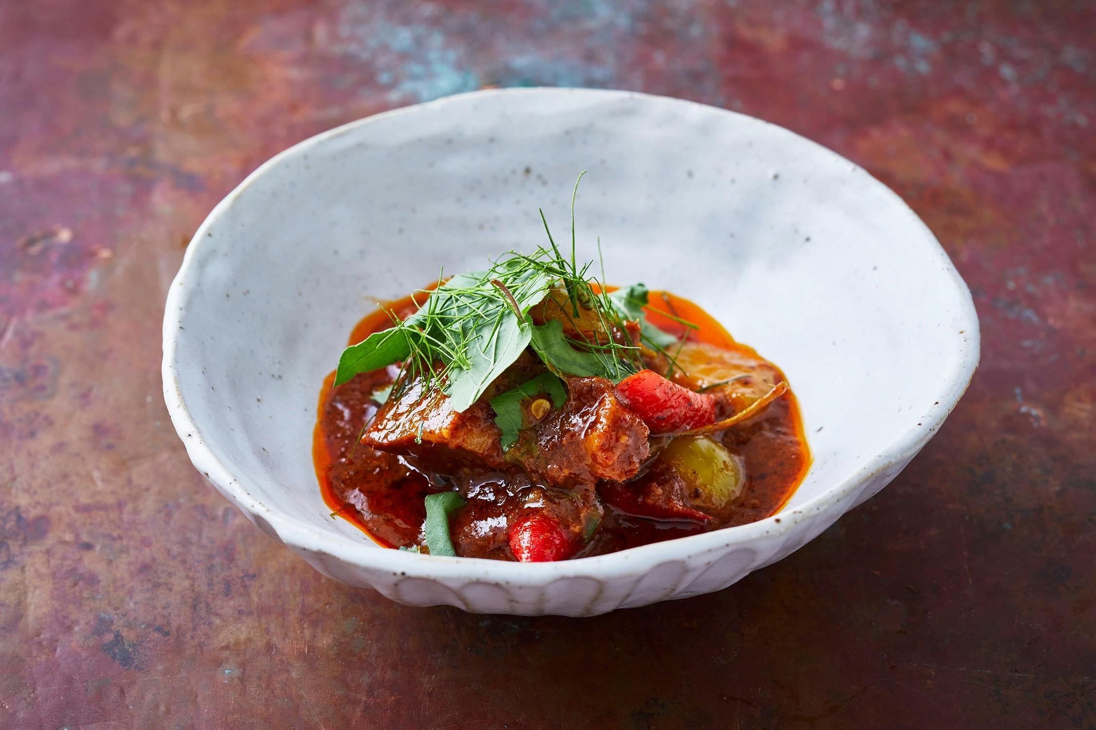 Learn from our award-winning chef's signature dishes, red curry of pork. Explore masterclasses.