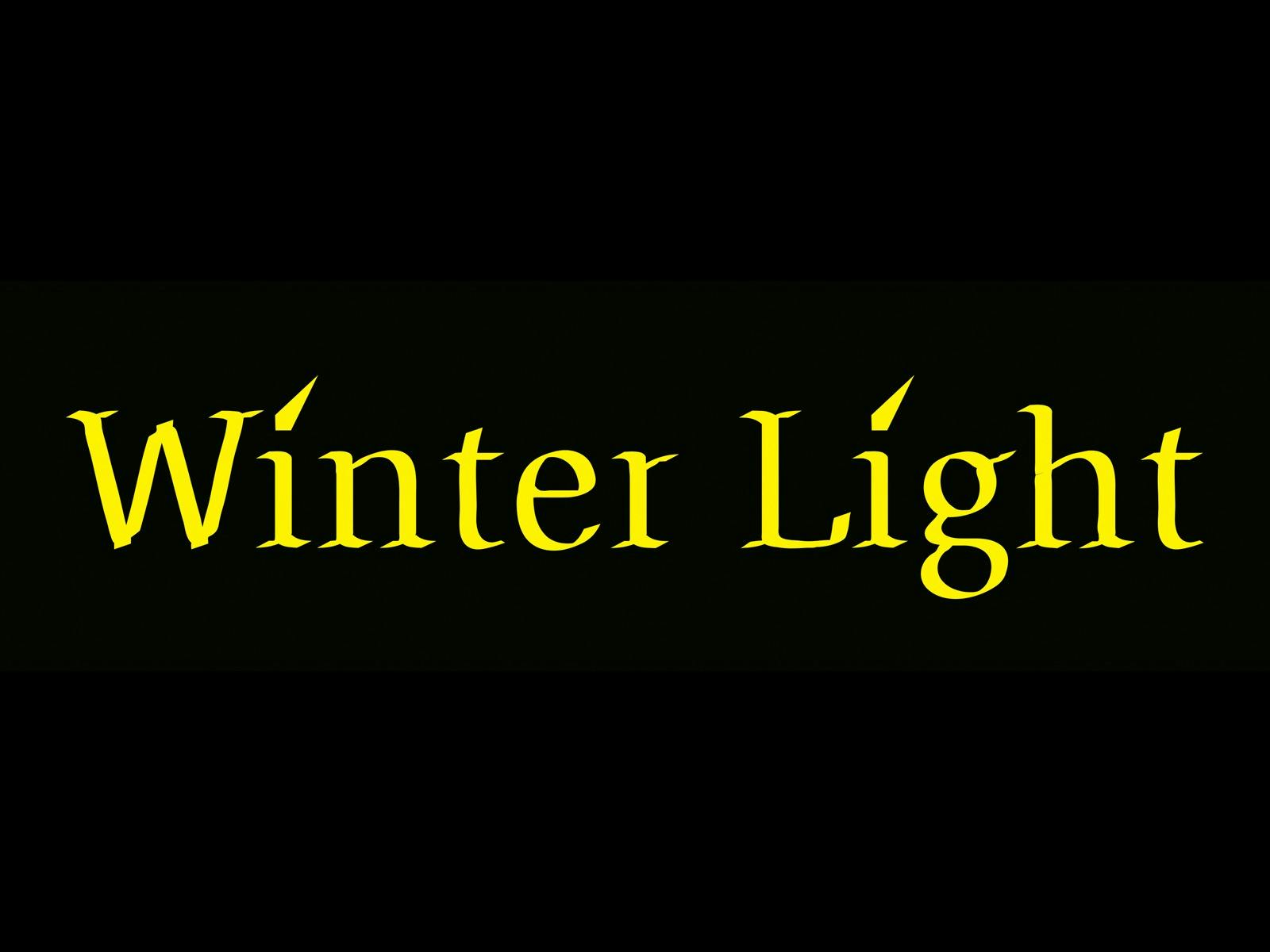 A black background with the words Winter Light sitting on it in yellow.