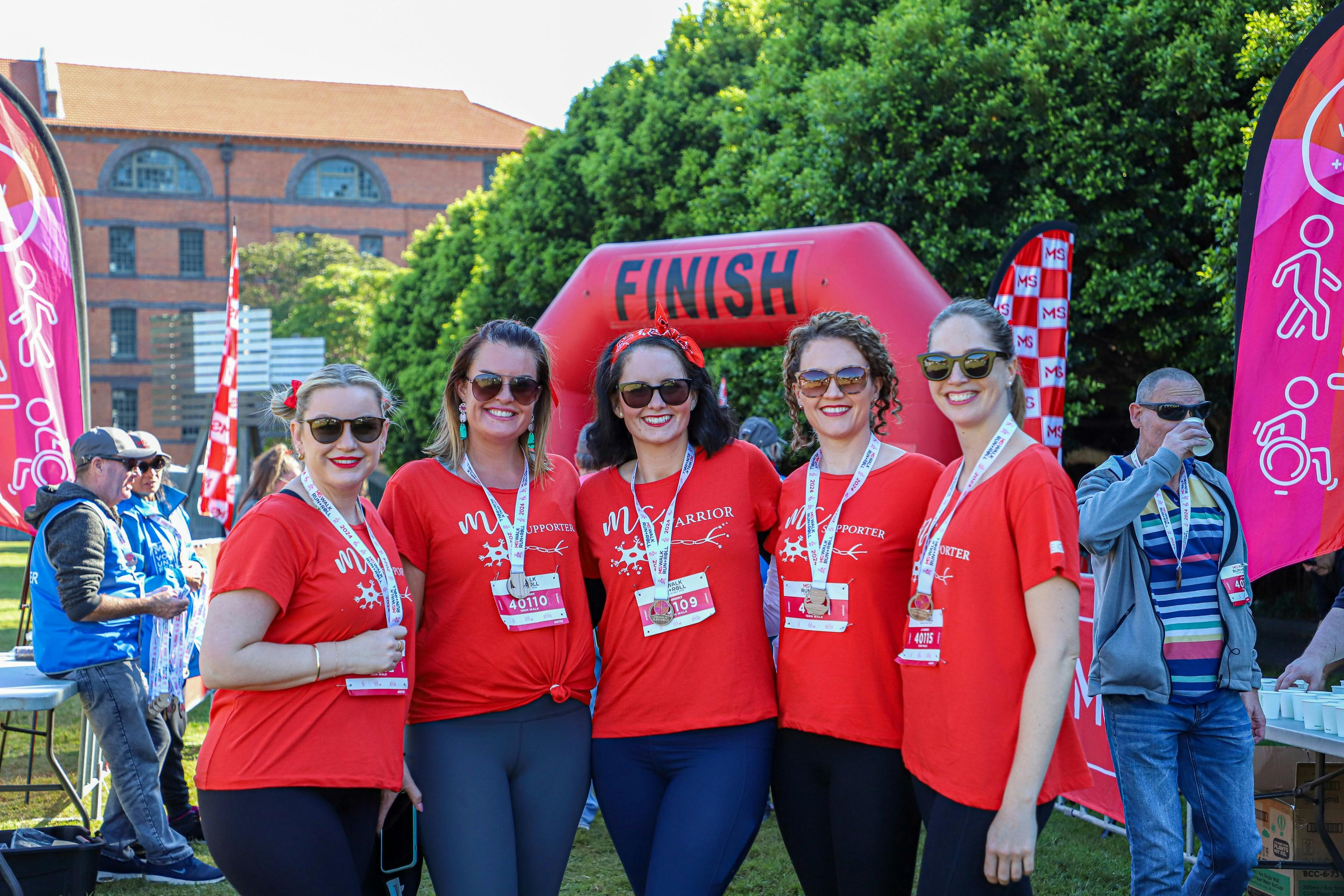 group of women in matching red shirts