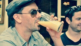 Gary drinking a beer on one of Andy's Trails Tours
