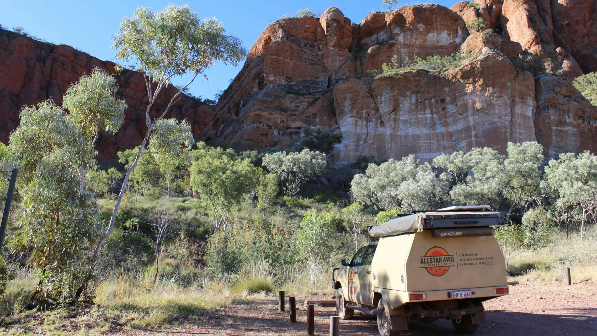 4WD camper parked at campground.