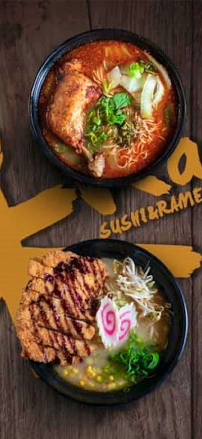 Six different ramen dishes on a wooden table.