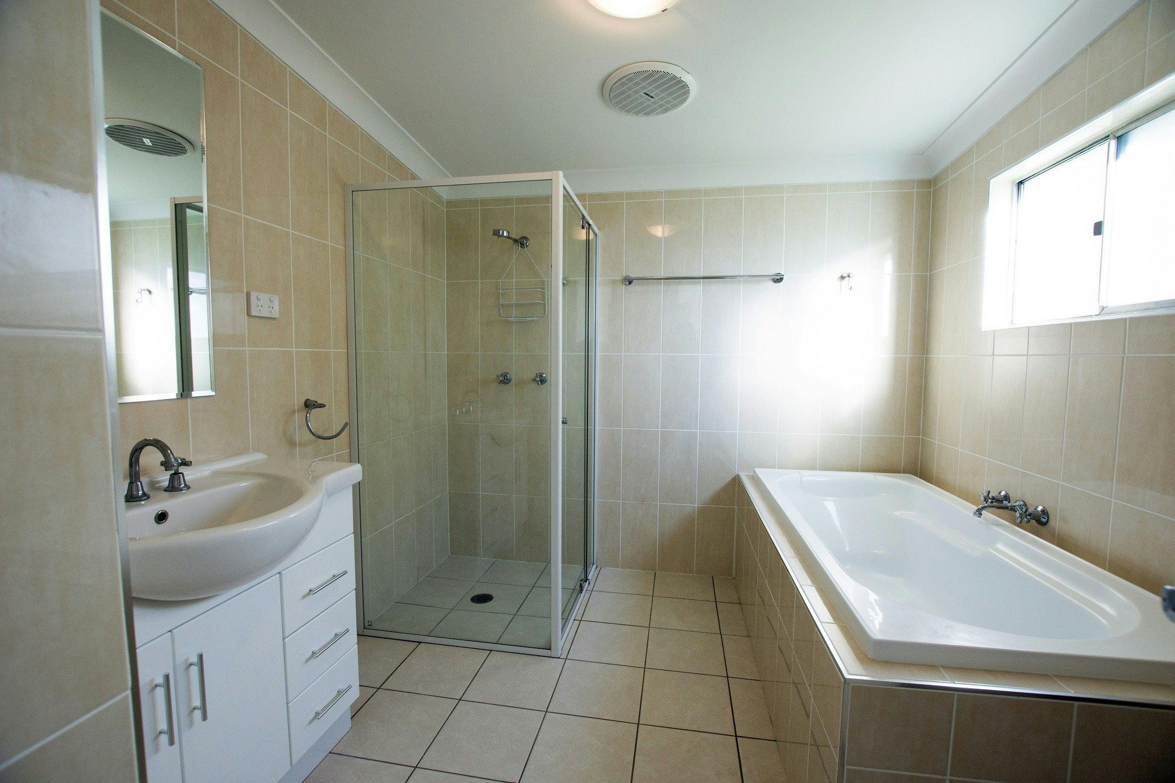 Main bathroom with bath