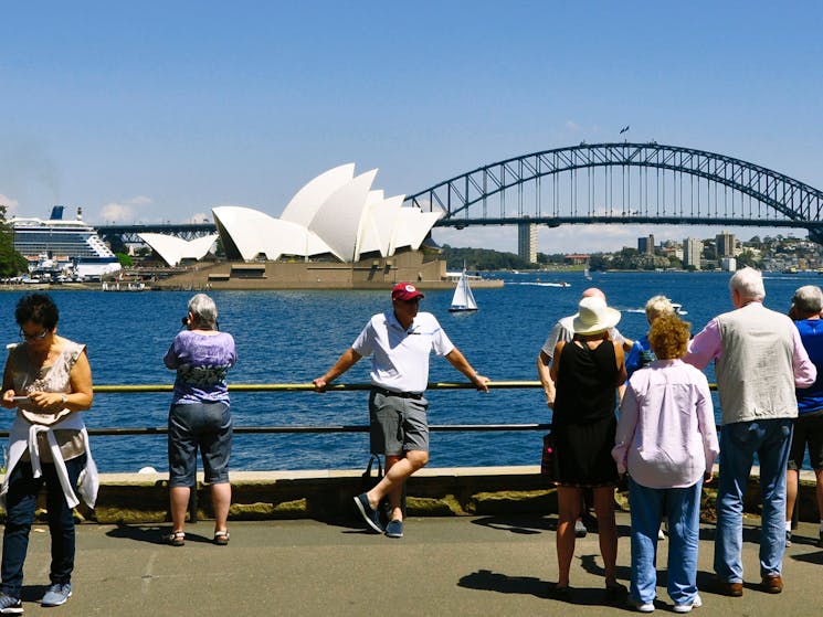 Another stop of Sydney City Tour Bus at Mrs Macquaries Point. Tourists are enjoying views of Harbour