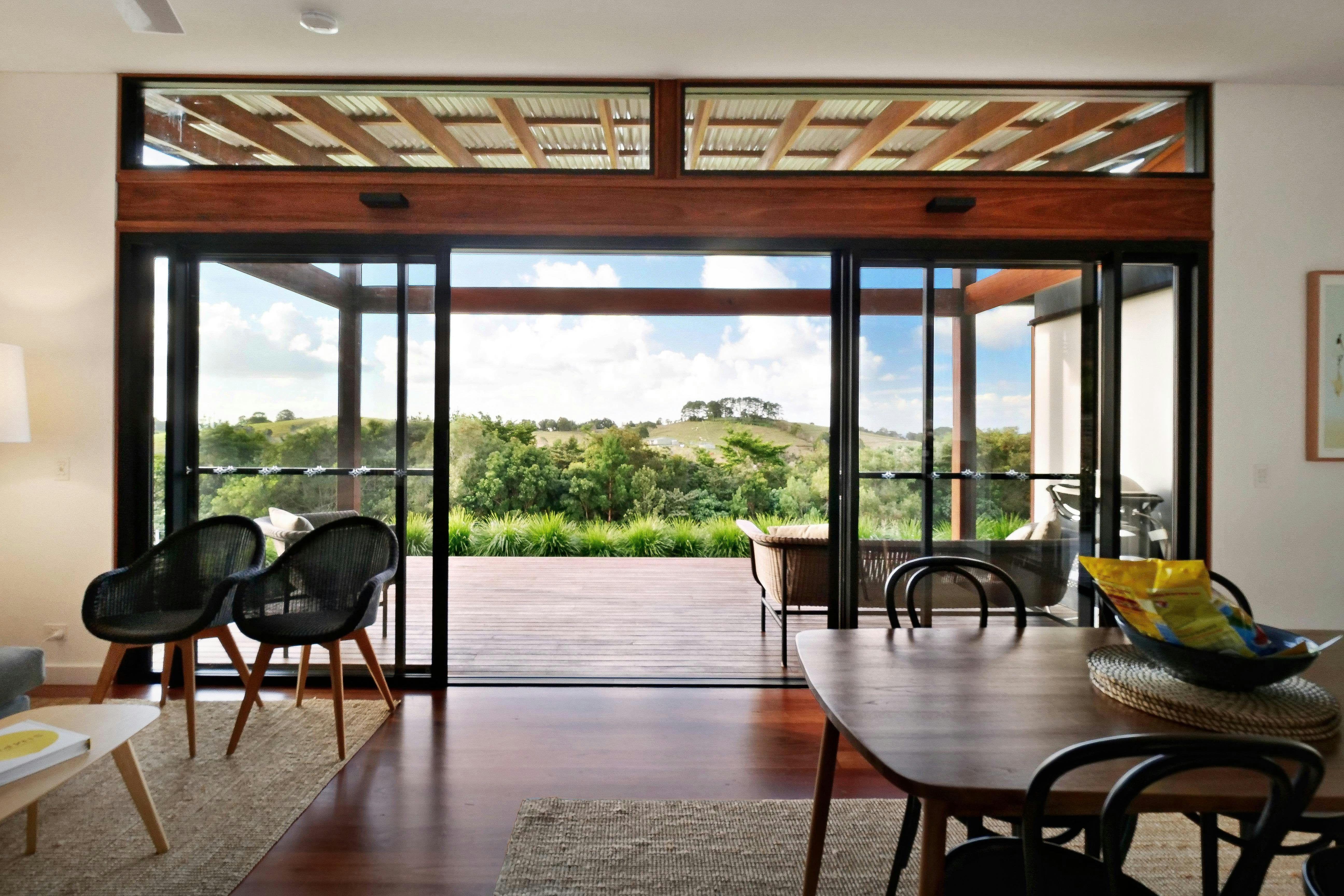 Open-plan living and dining area, ideal for relaxing in privacy and enjoying the hinterland view.