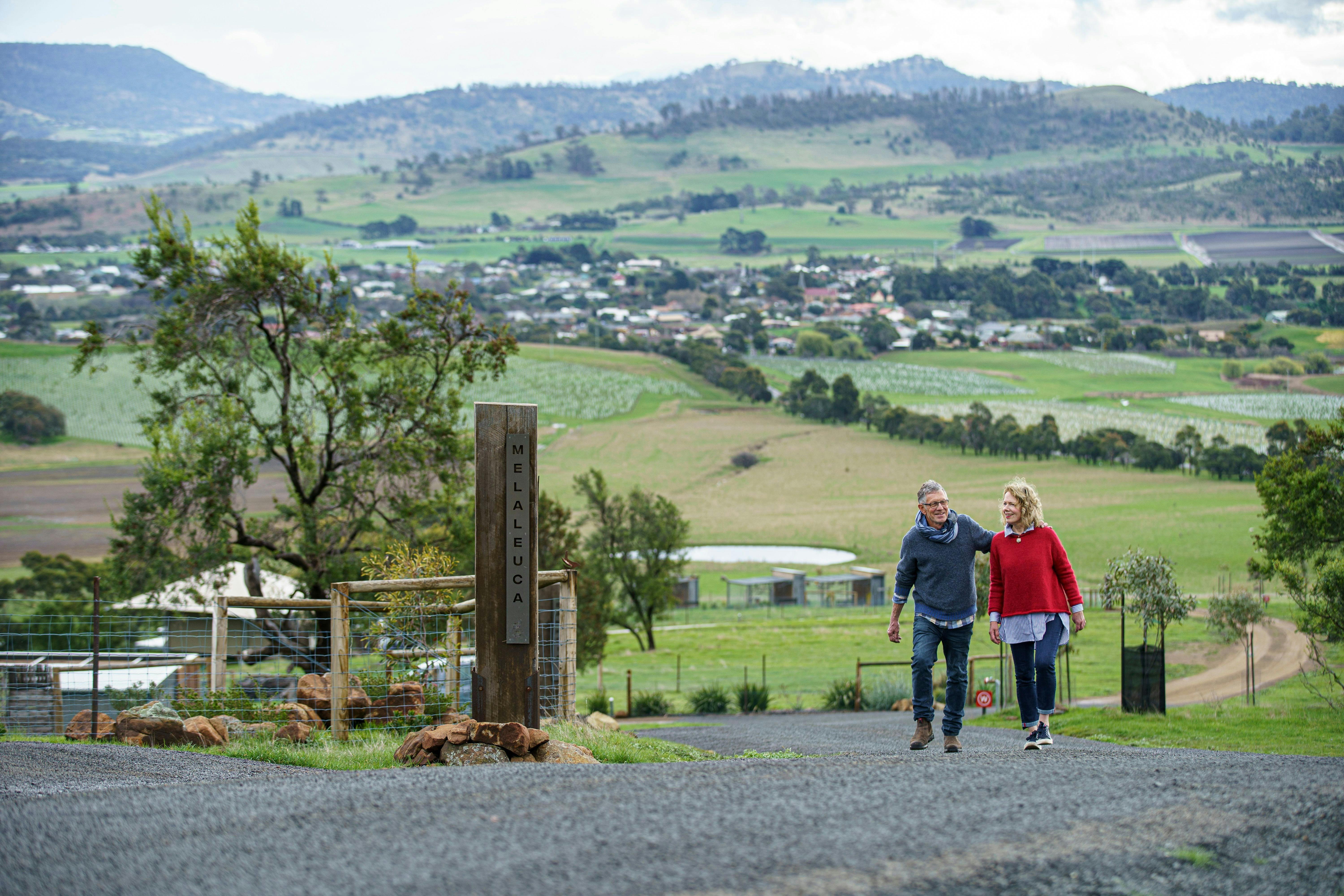 Couple walking in retreat grounds