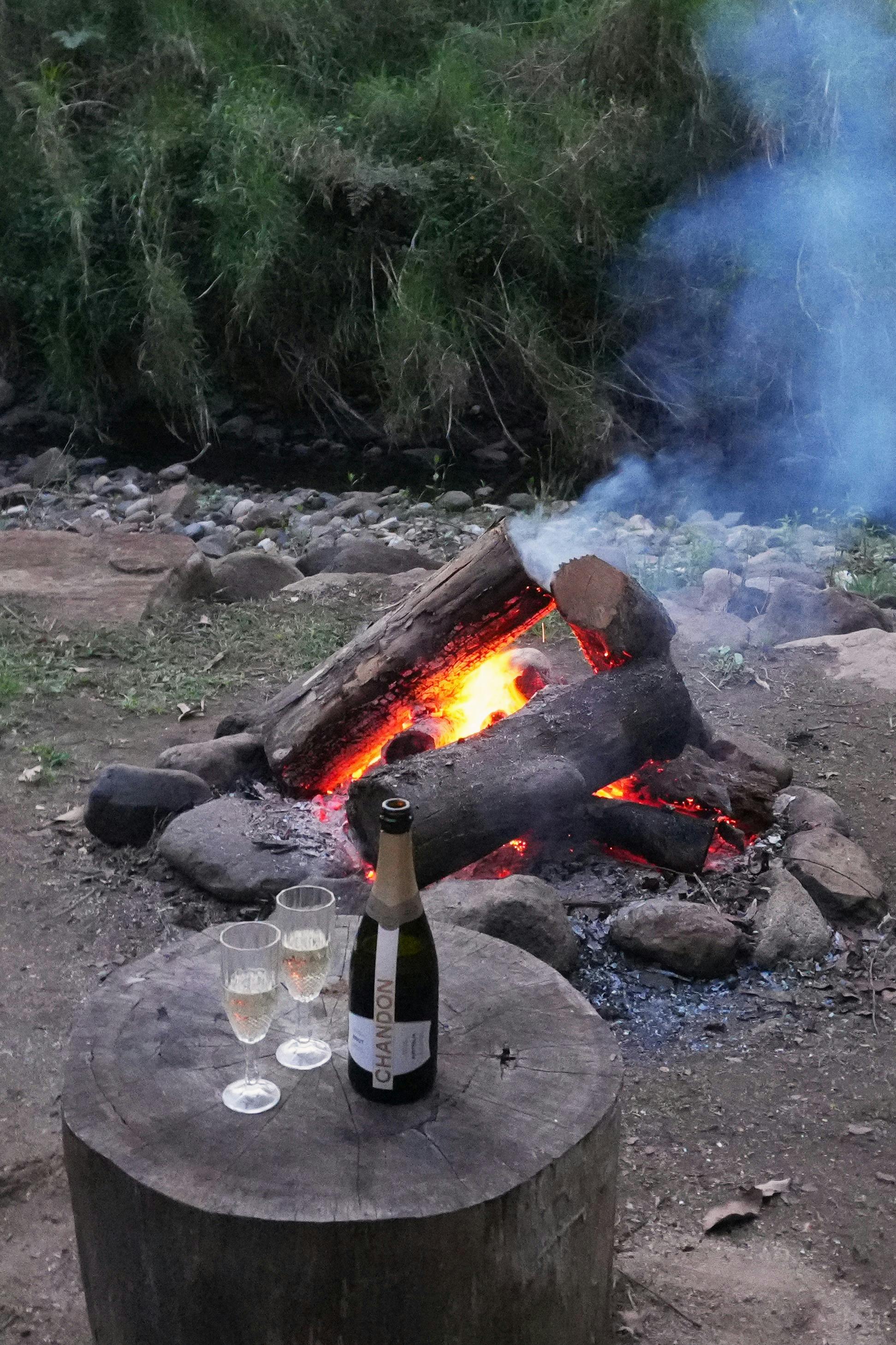 lit firepit at glamptent