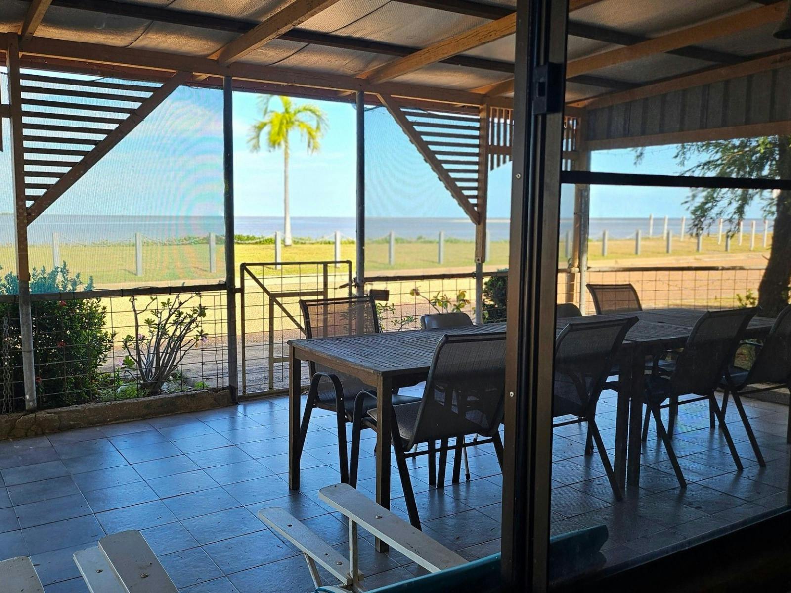 Outdoor dining area overlooking Karumba Esplanade