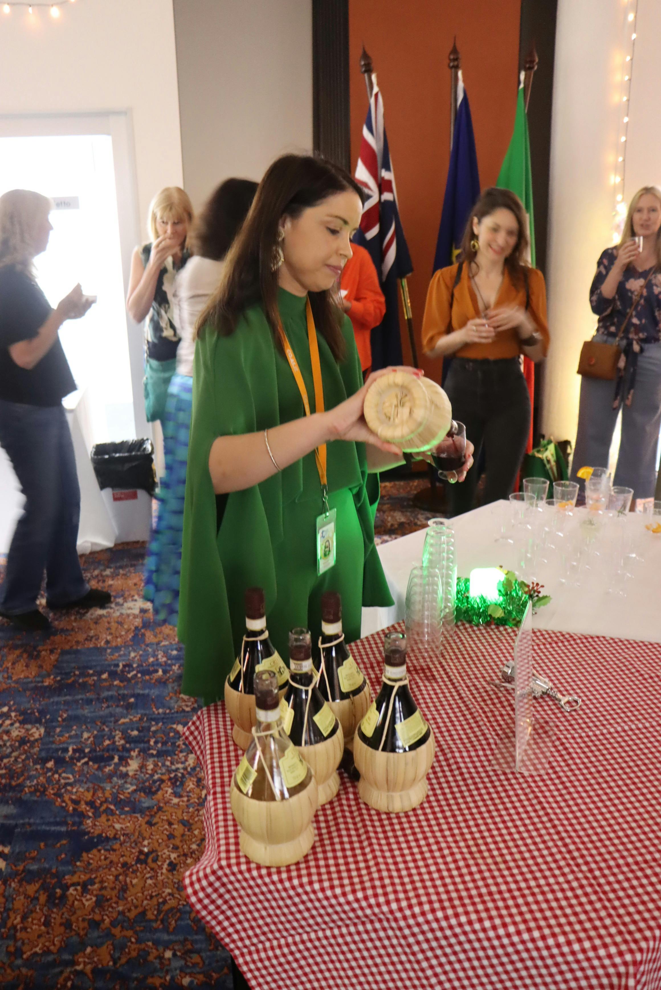 Staff pouring wine into a glass
