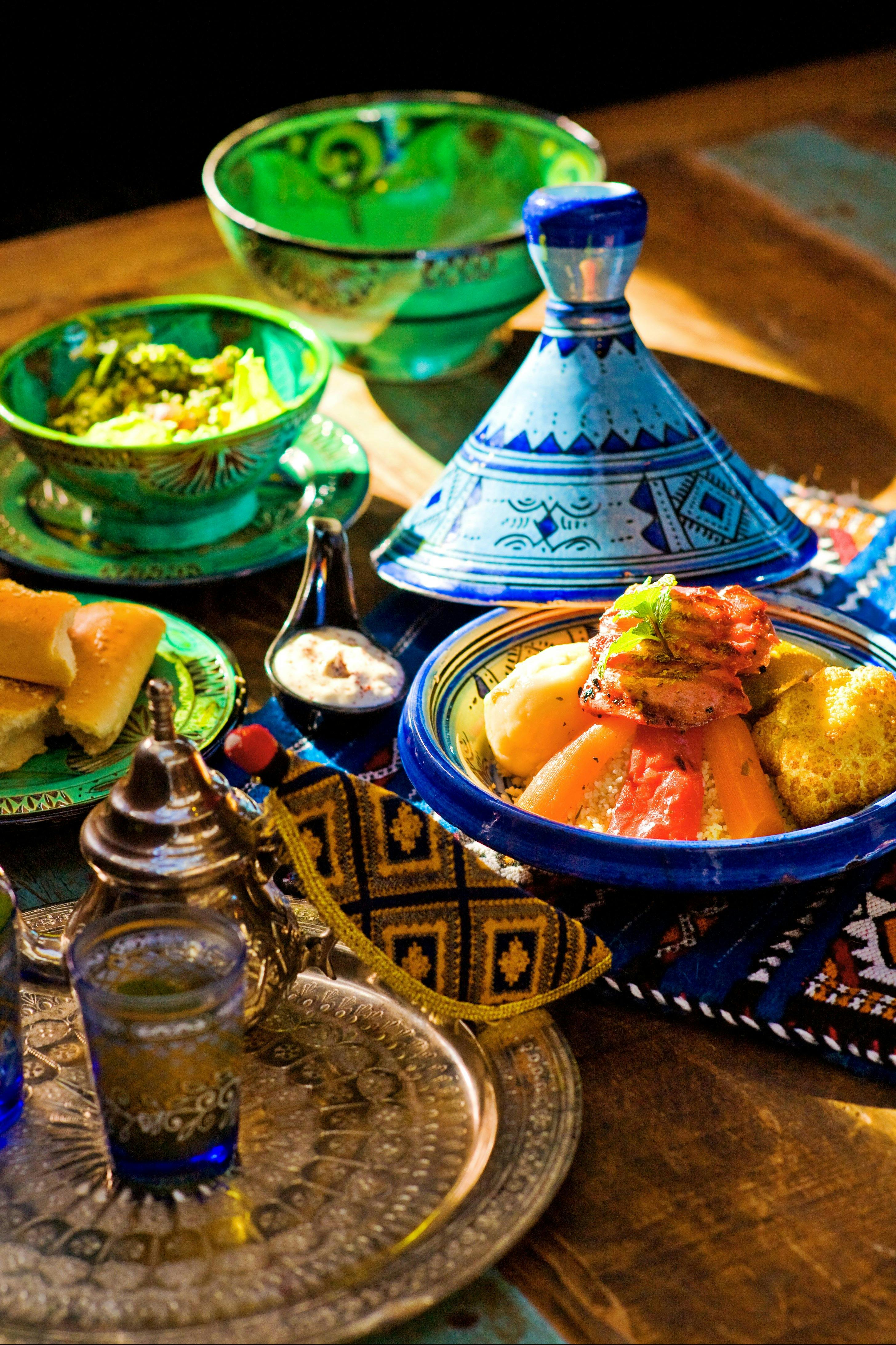 Display of Moroccan dishes, tagine and teapot