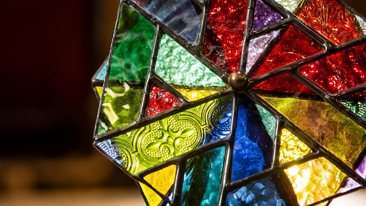 Geometric styled glass art, multicoloured. Geometric styled glass art, multicoloured.