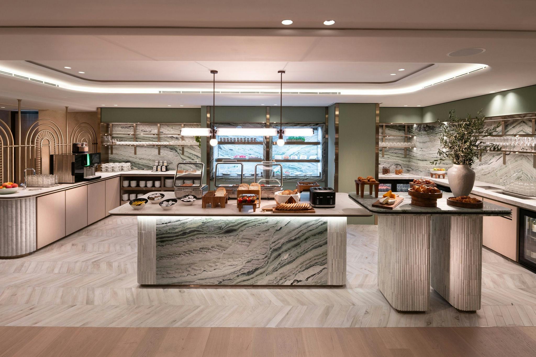 Image of the kitchen with buffet breakfast spread in the Hilton Sydney Executive Lounge