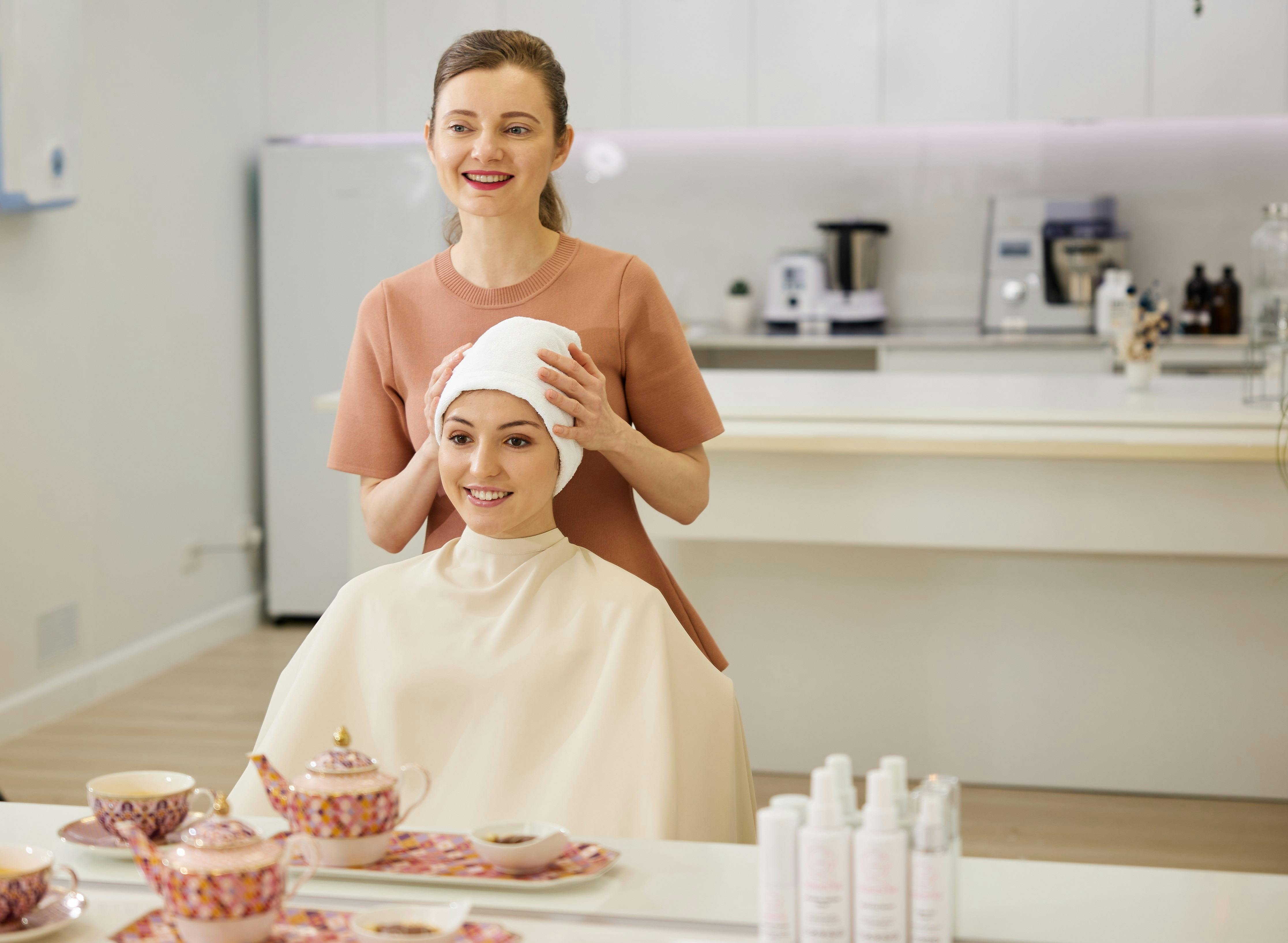 Japanese head spa ritual with herbal tea and relaxation in Melbourne. calming post-treatment tea.