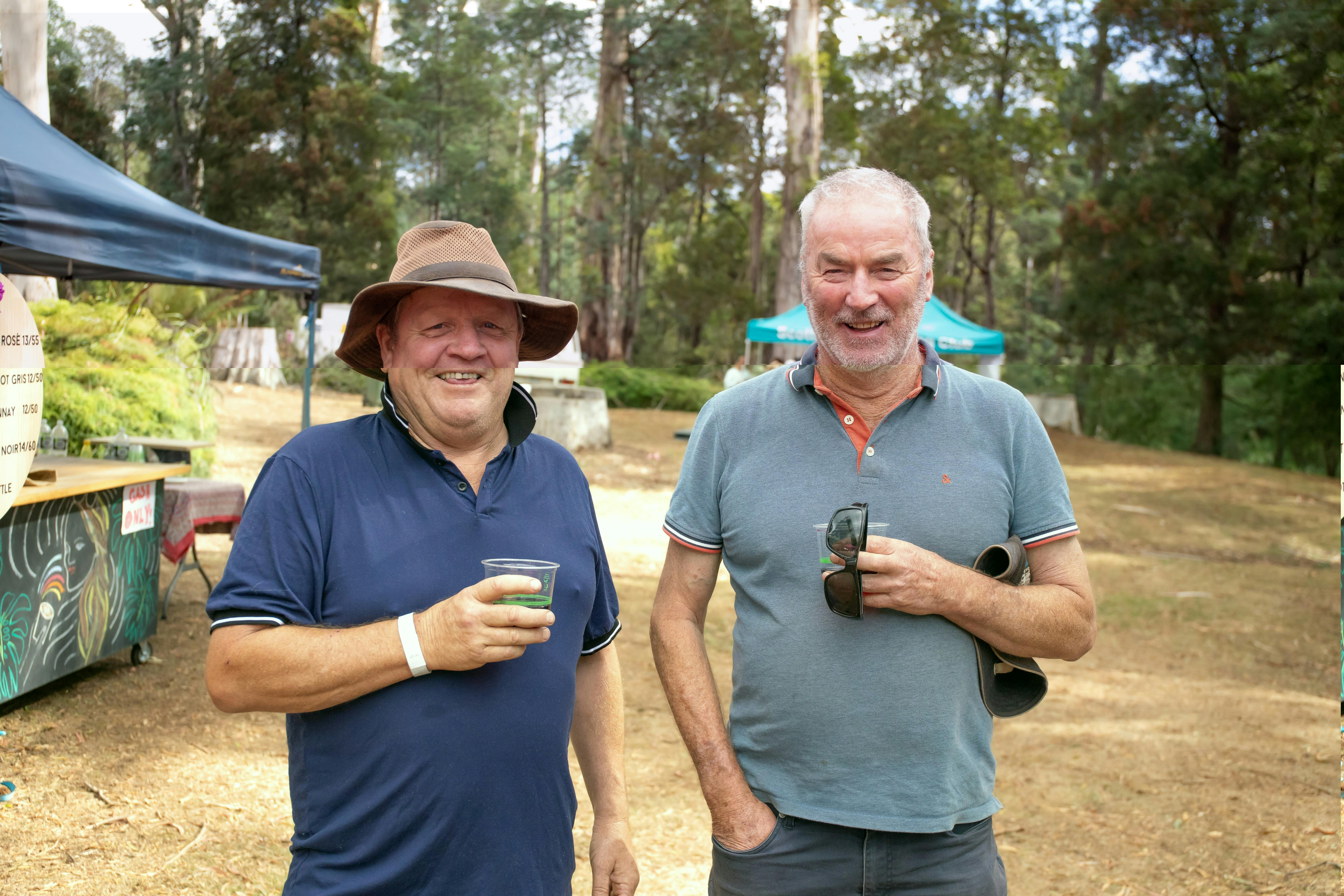 Two men standing in park