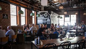 Many customers and young families dining inside FogHorn Brewhouse