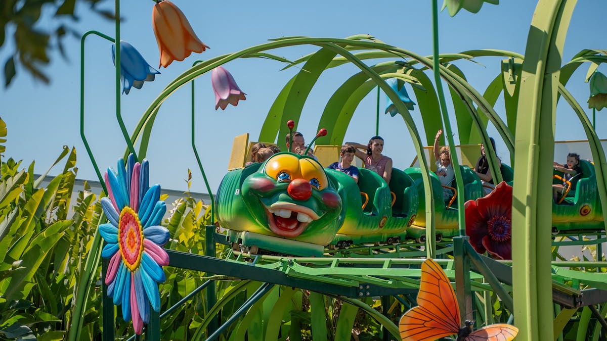 Kids giggle and zoom on the Bug Run at Aussie World, Sunshine Coast’s top ride for young families.