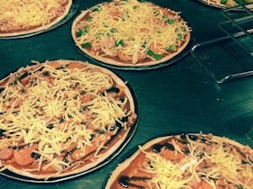 The Cave Woodfired Pizza Bar
