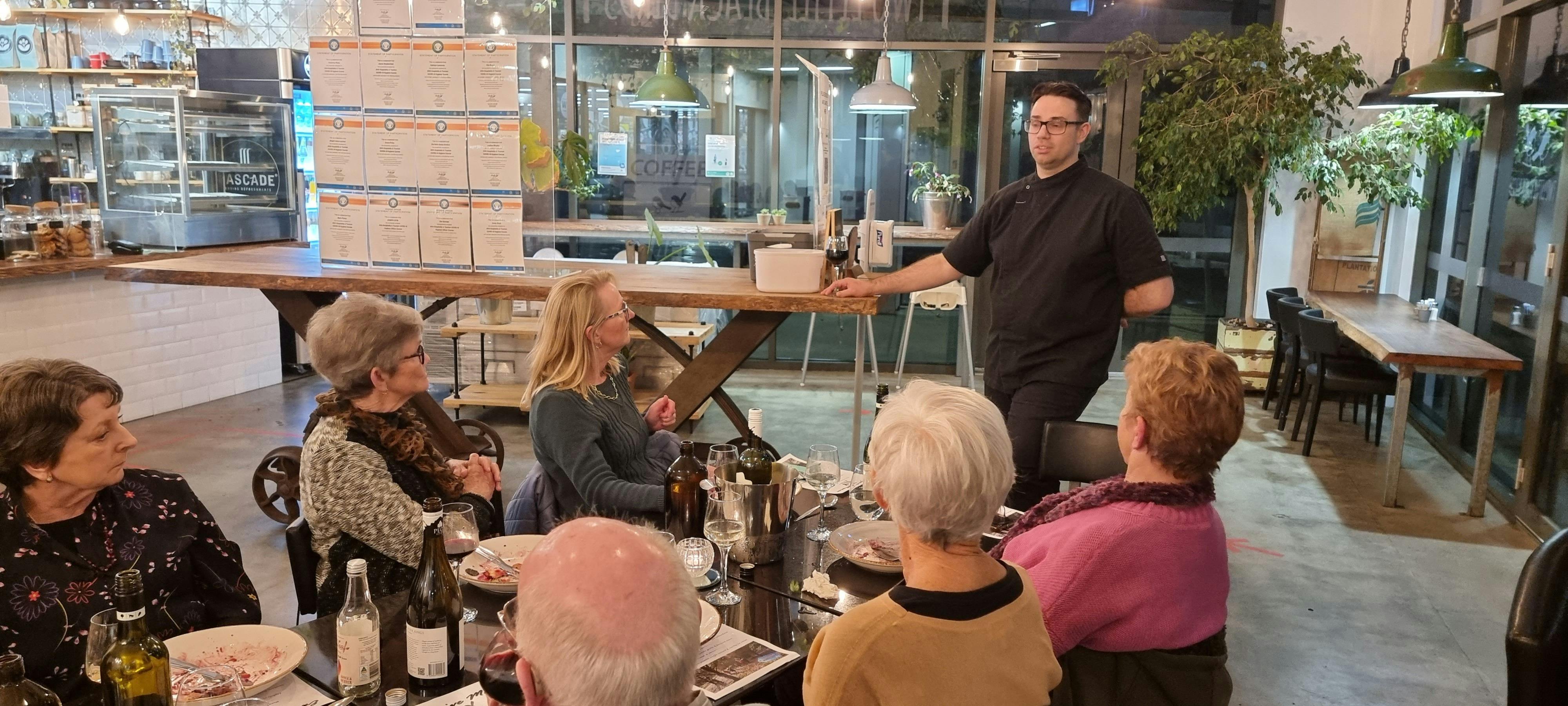 People sitting for Truffle Degustation with Chef Joe Ditri