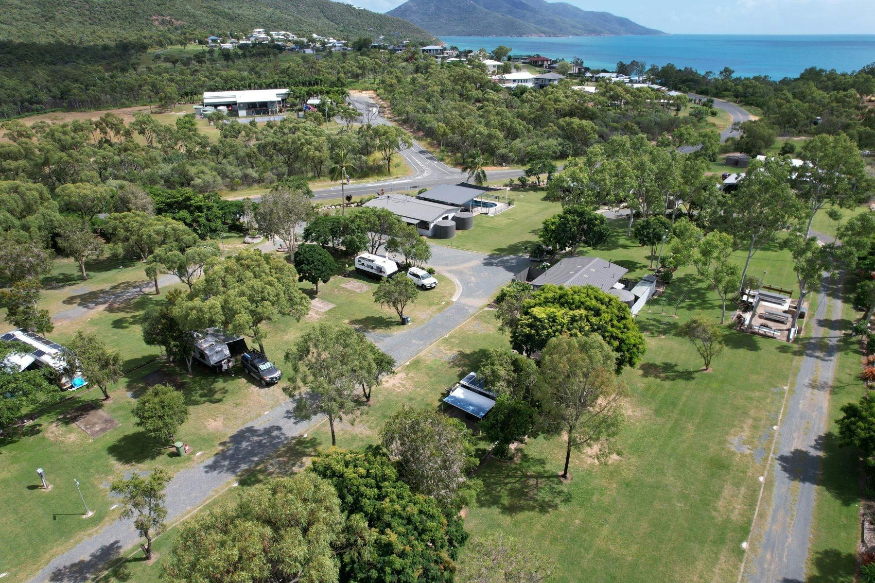 Aerial of Hydeaway Bay Caravan Park, facing back towards Cape Gloucester.