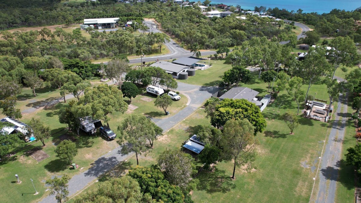 Aerial of Hydeaway Bay Caravan Park, facing back towards Cape Gloucester. Aerial of Hydeaway Bay Caravan Park, facing back towards Cape Gloucester.