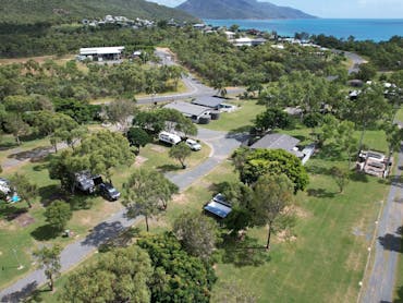 Aerial of Hydeaway Bay Caravan Park, facing back towards Cape Gloucester.