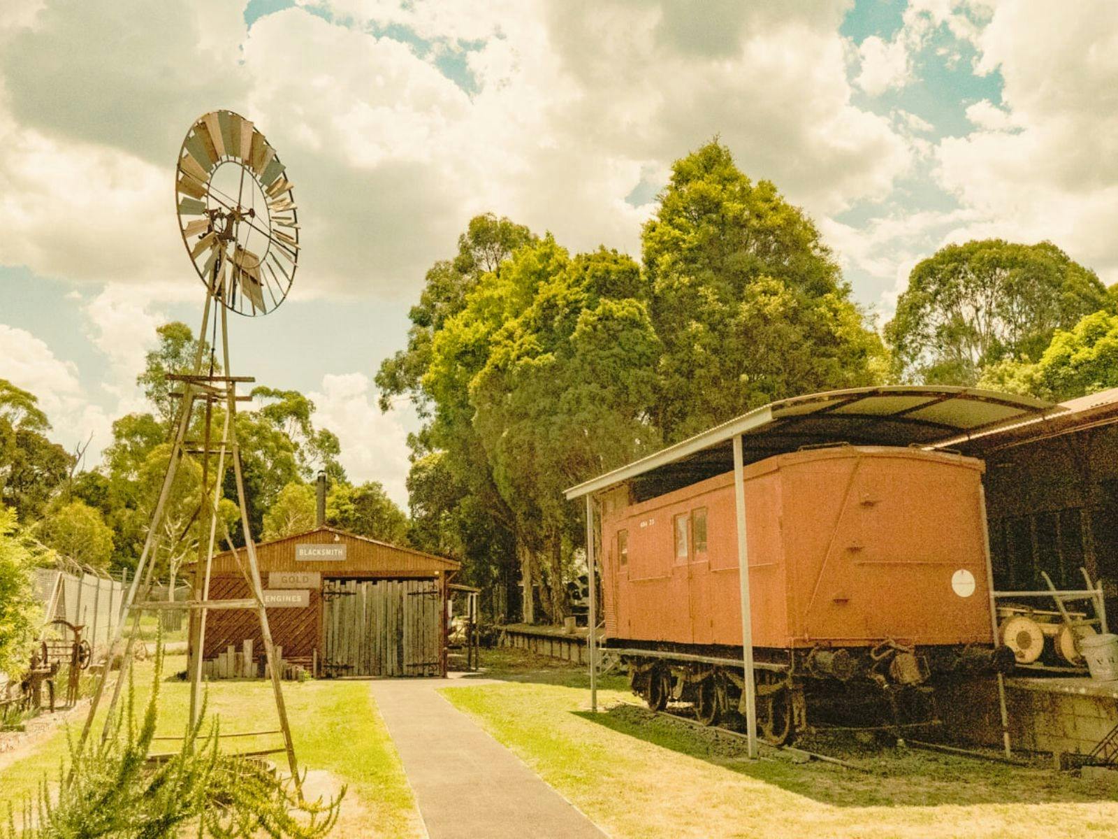 Windmill, train wagon, sheds