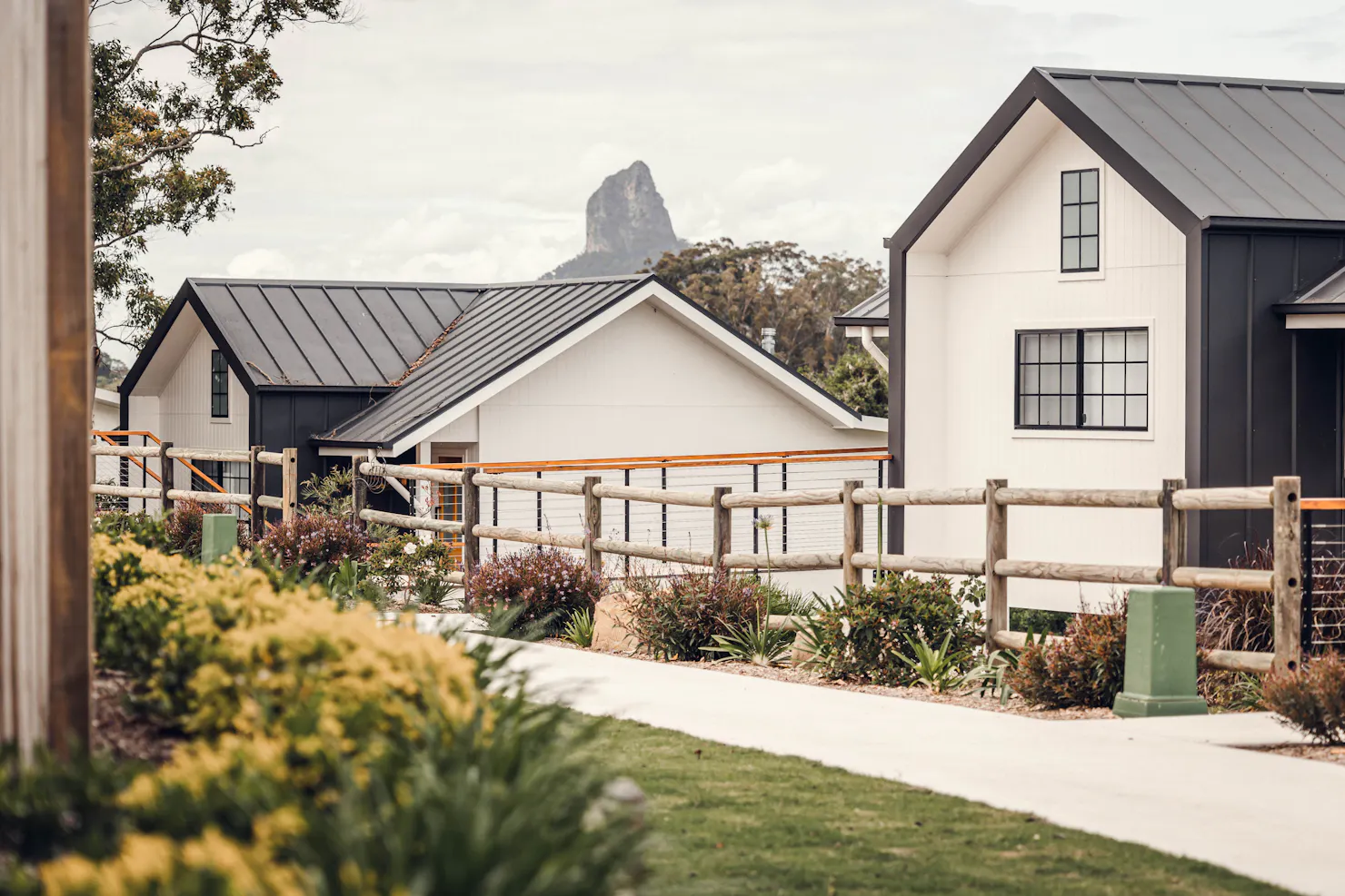 Accessible athway leading to each cabin with Glasshouse Mountains in the background