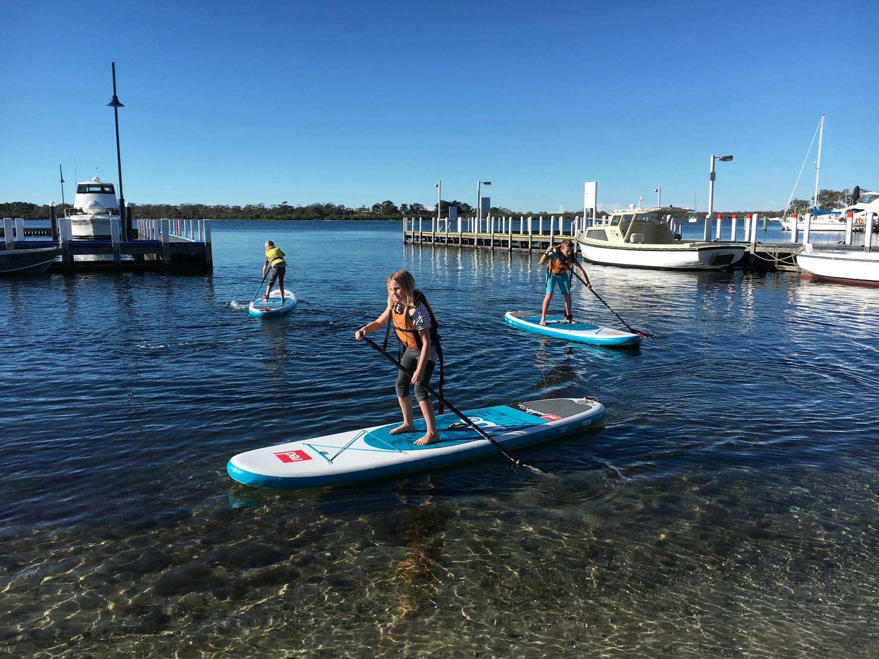 Using Red Paddle Co inflatable SUPs in a range of sizes, you'll be gliding on the lake in no time