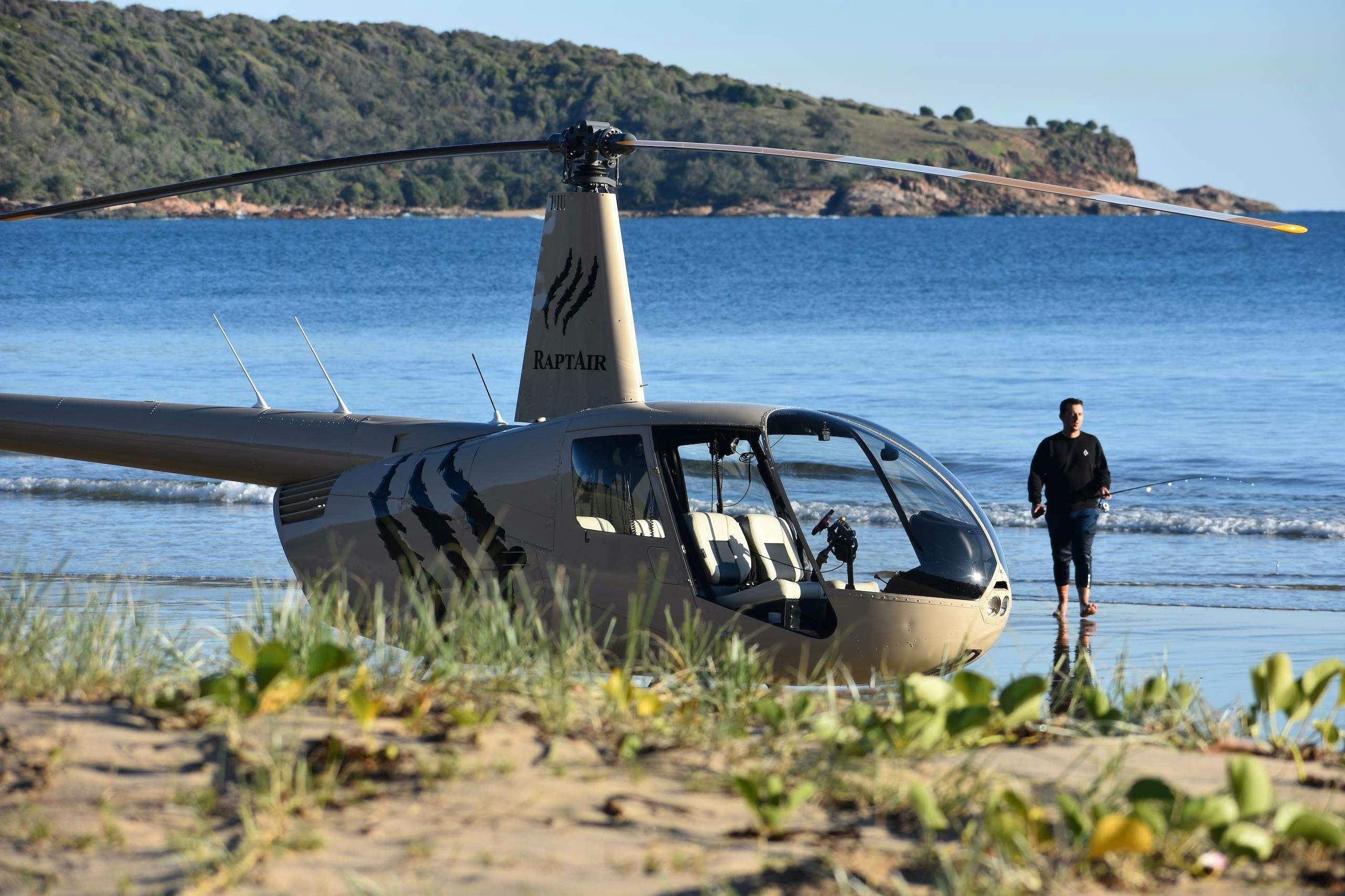 Alone on the beach Helicopter paddling and fishing