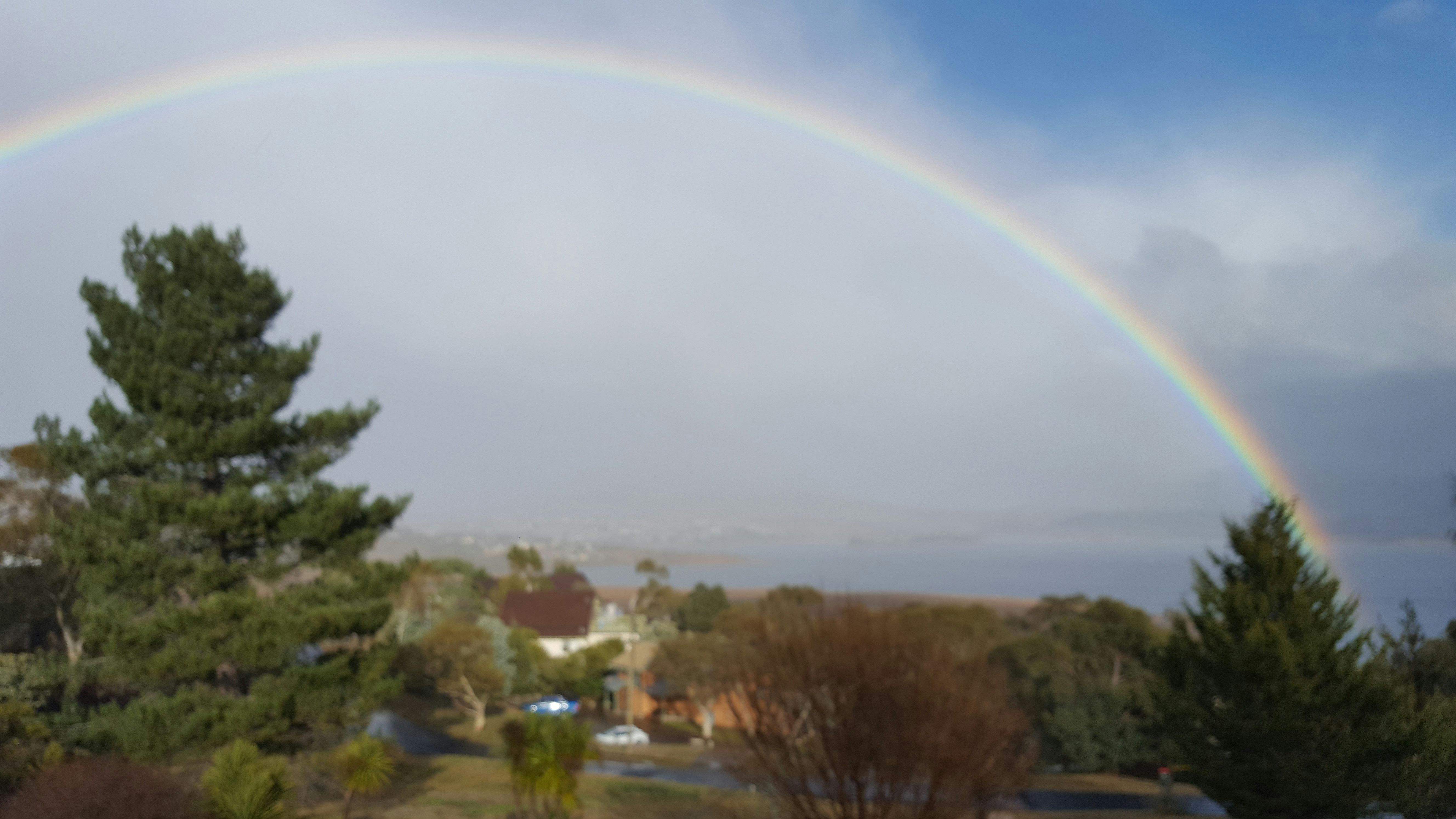 rainbow over lake