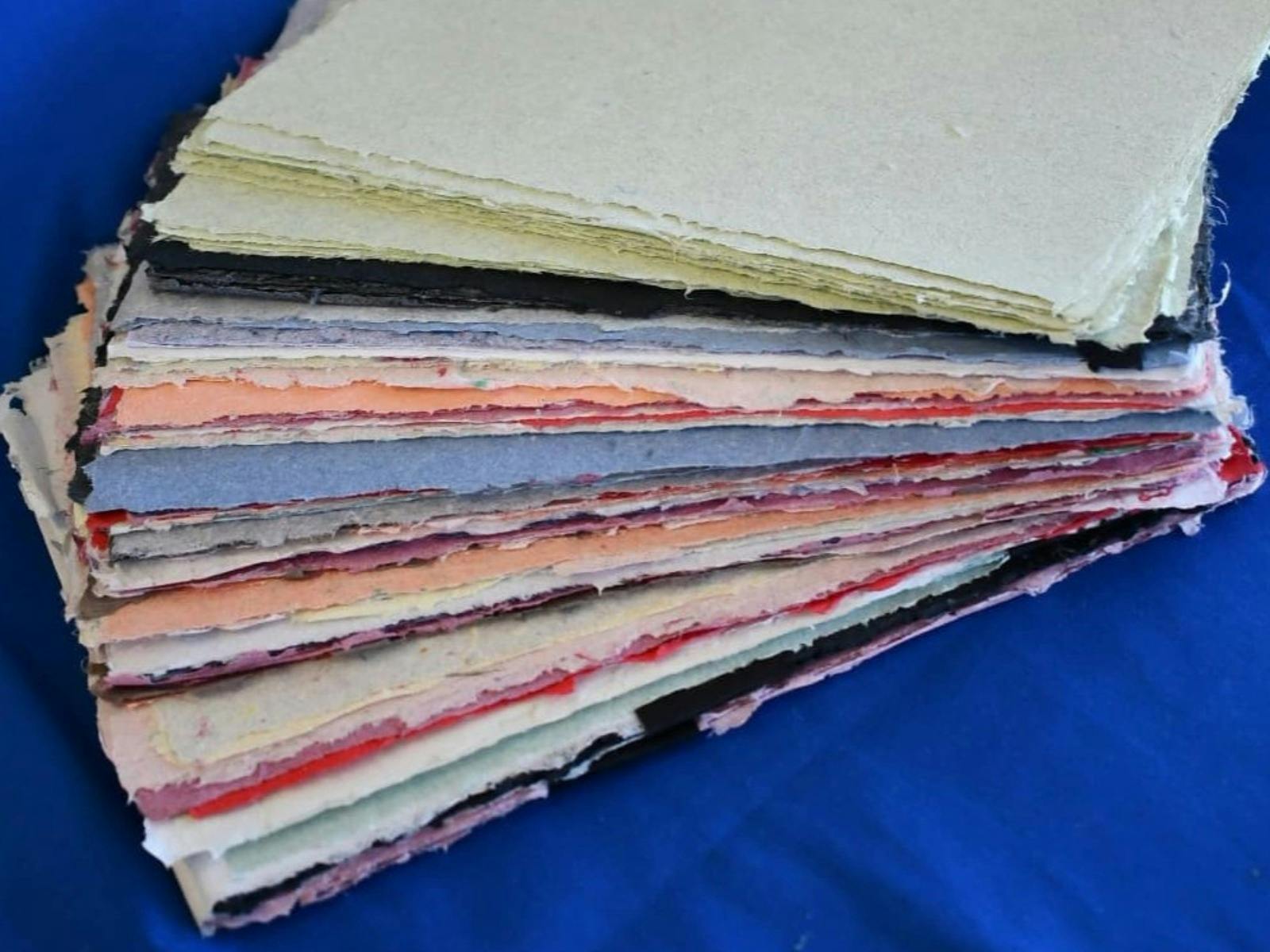 Stack of coloured papers made at Creative Paper Tasmania, Wynyard, Tasmania
