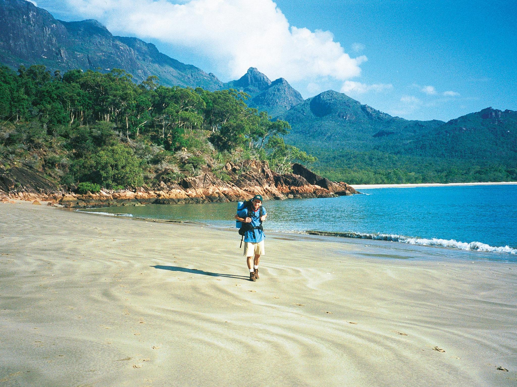 Hiker on beach Hiker on beach