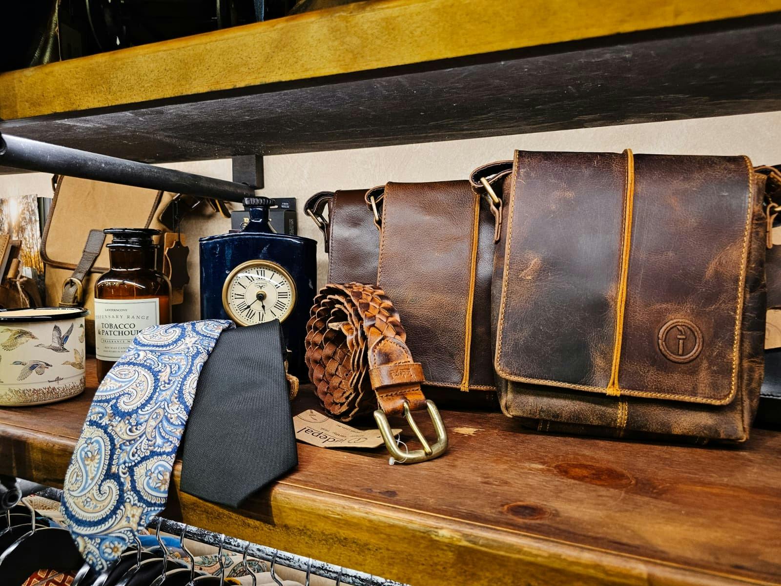 Indepal leather messenger bags and woven belt, styled with ties and gifts for him