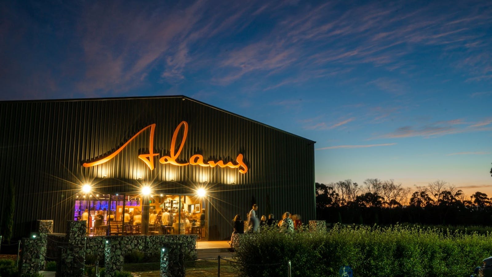 Adam's Distillery outside evening