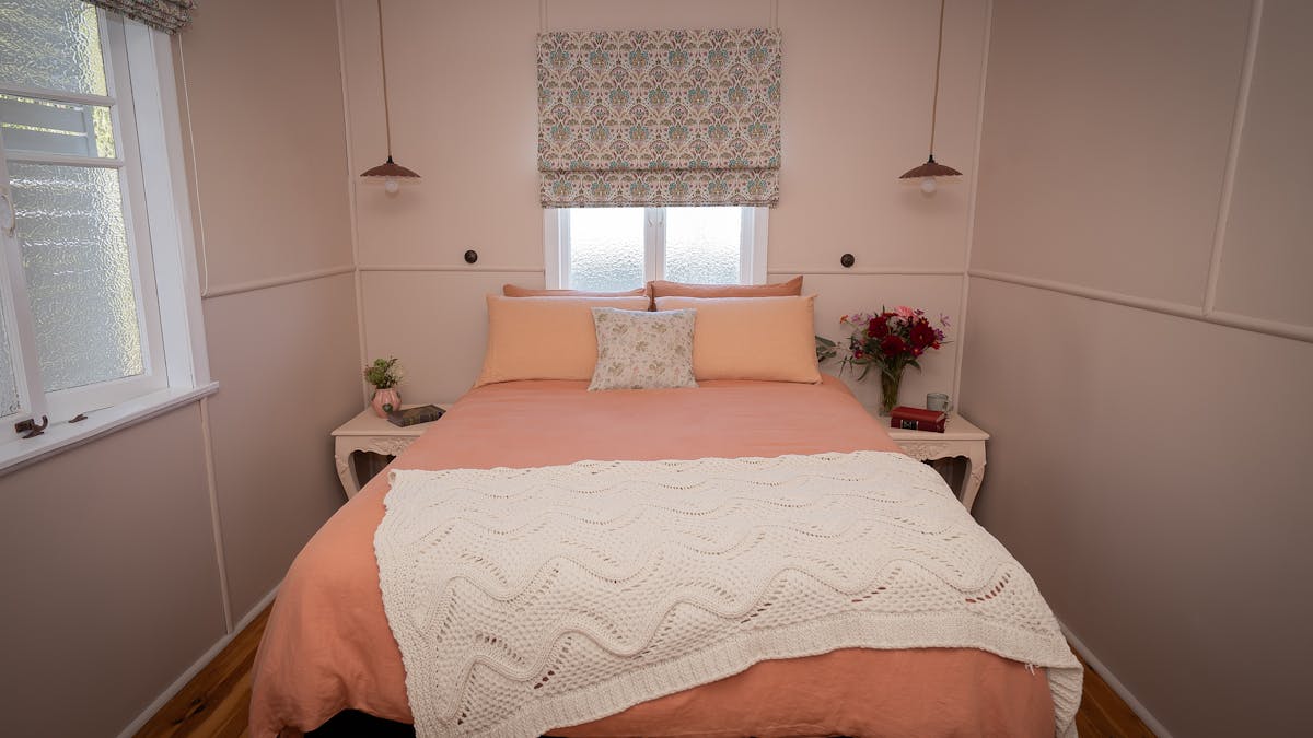 Comfortable queen size bed, linen bedding, Australian wool doona