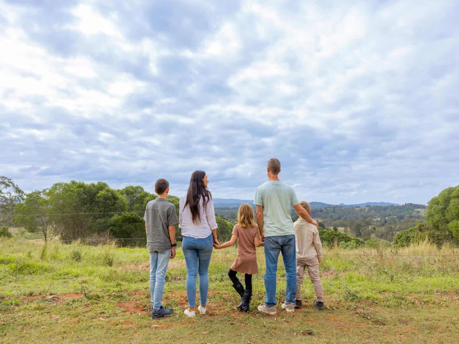 A family looking out at the view from Amamoor Lookout A family looking out at the view from Amamoor Lookout
