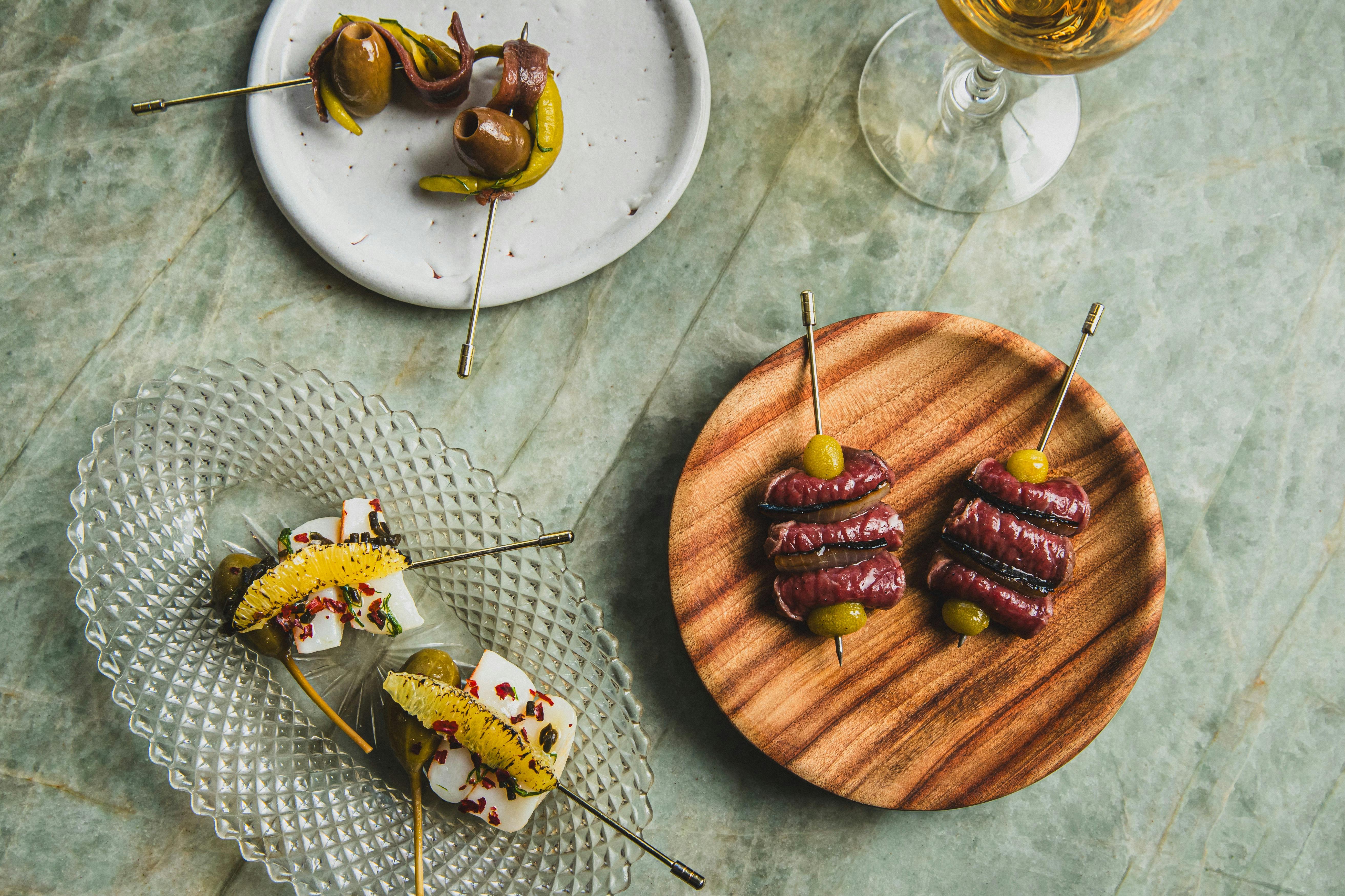 tapas snacks and drink of wine at Gildas