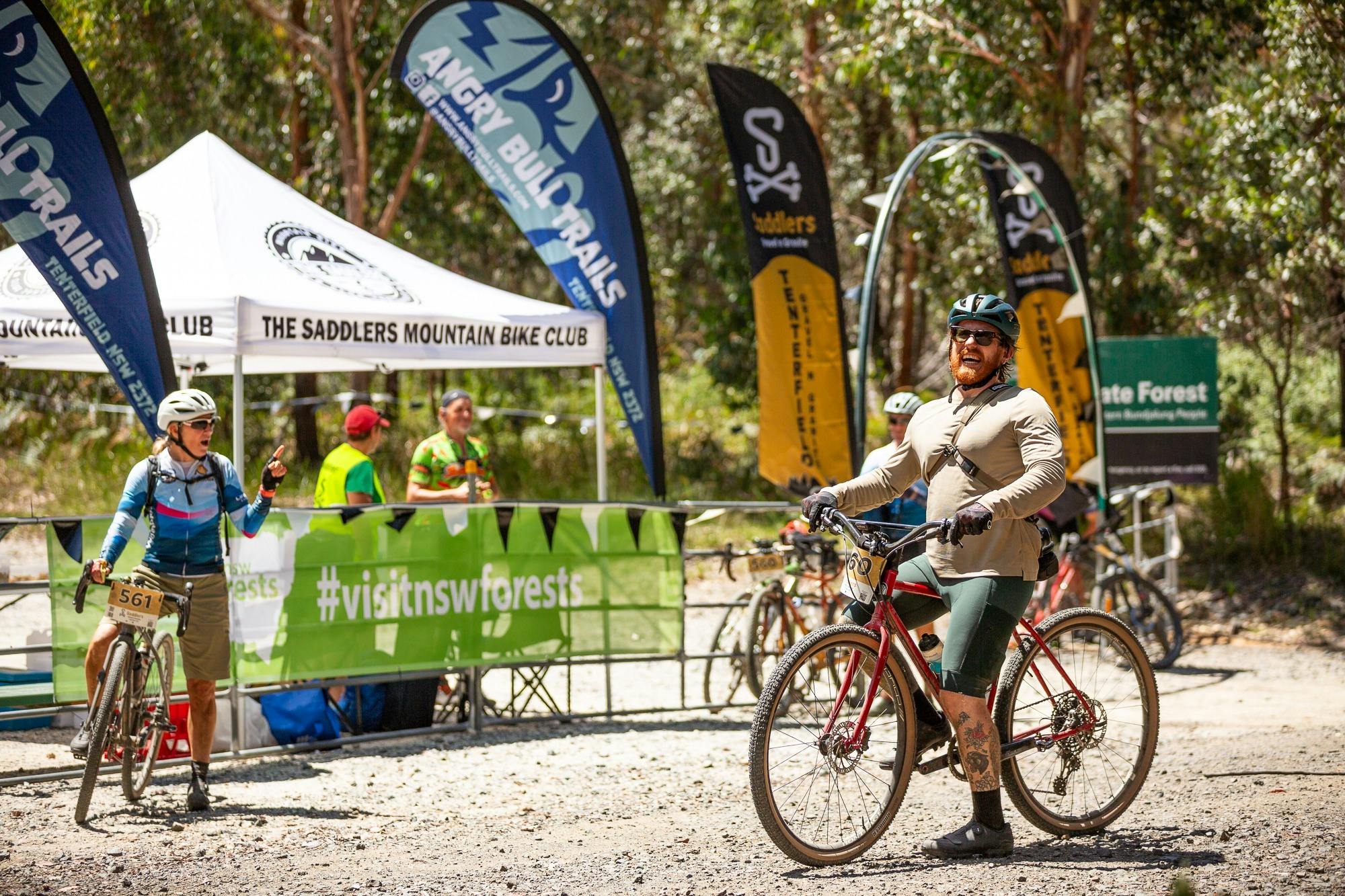 Riders stopping at Feed Station 4 for water and snacks.