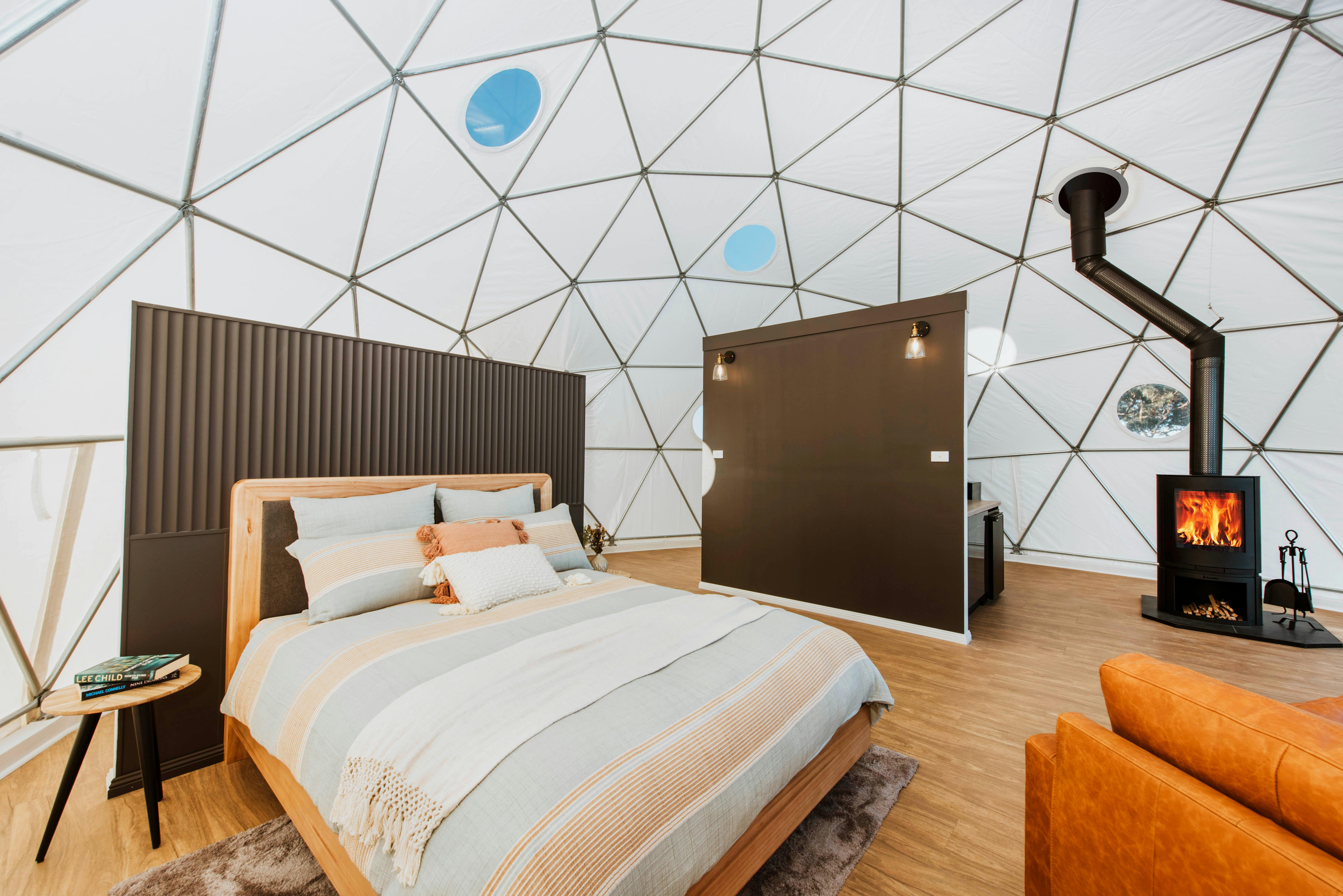 View of bedroom with fire in background