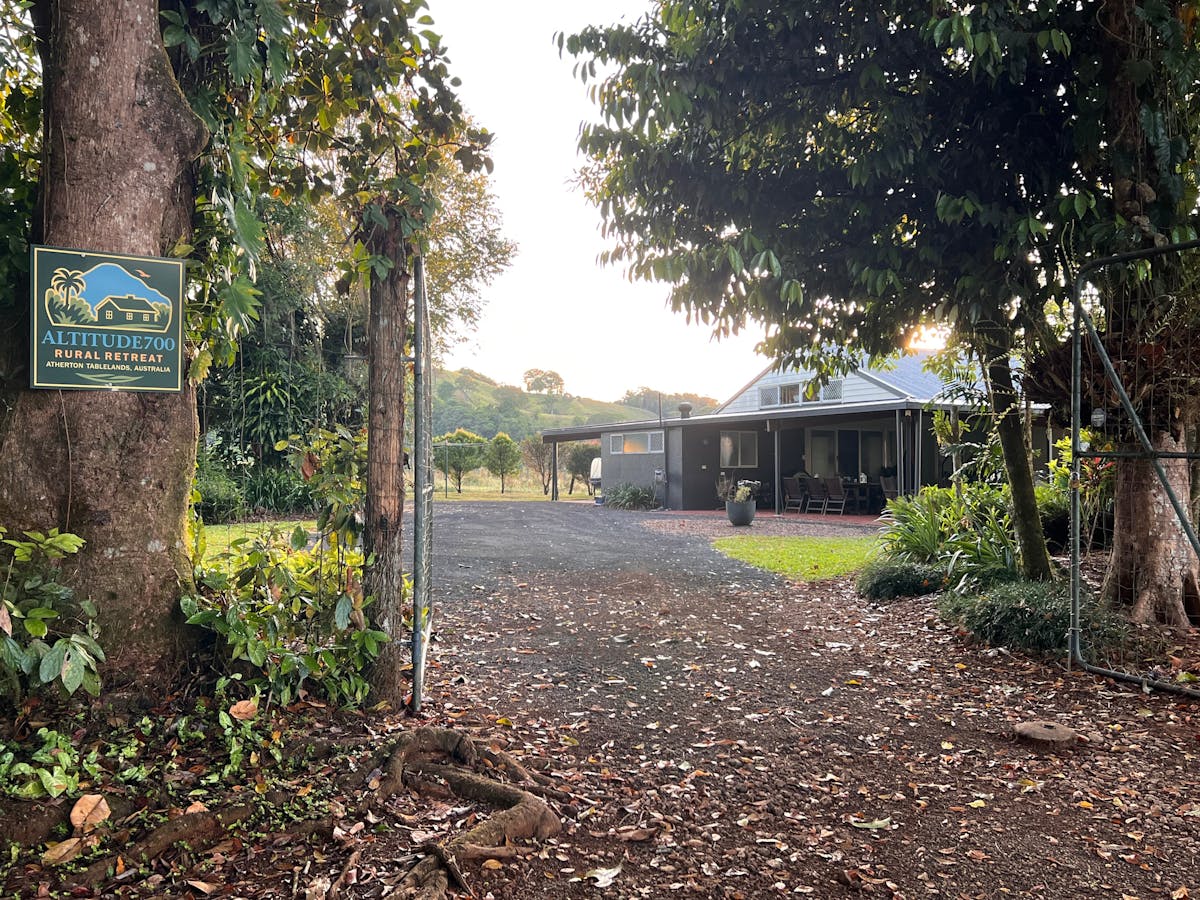 Surrounded by mature trees & open paddocks & looking out to expansive valley and mountain views