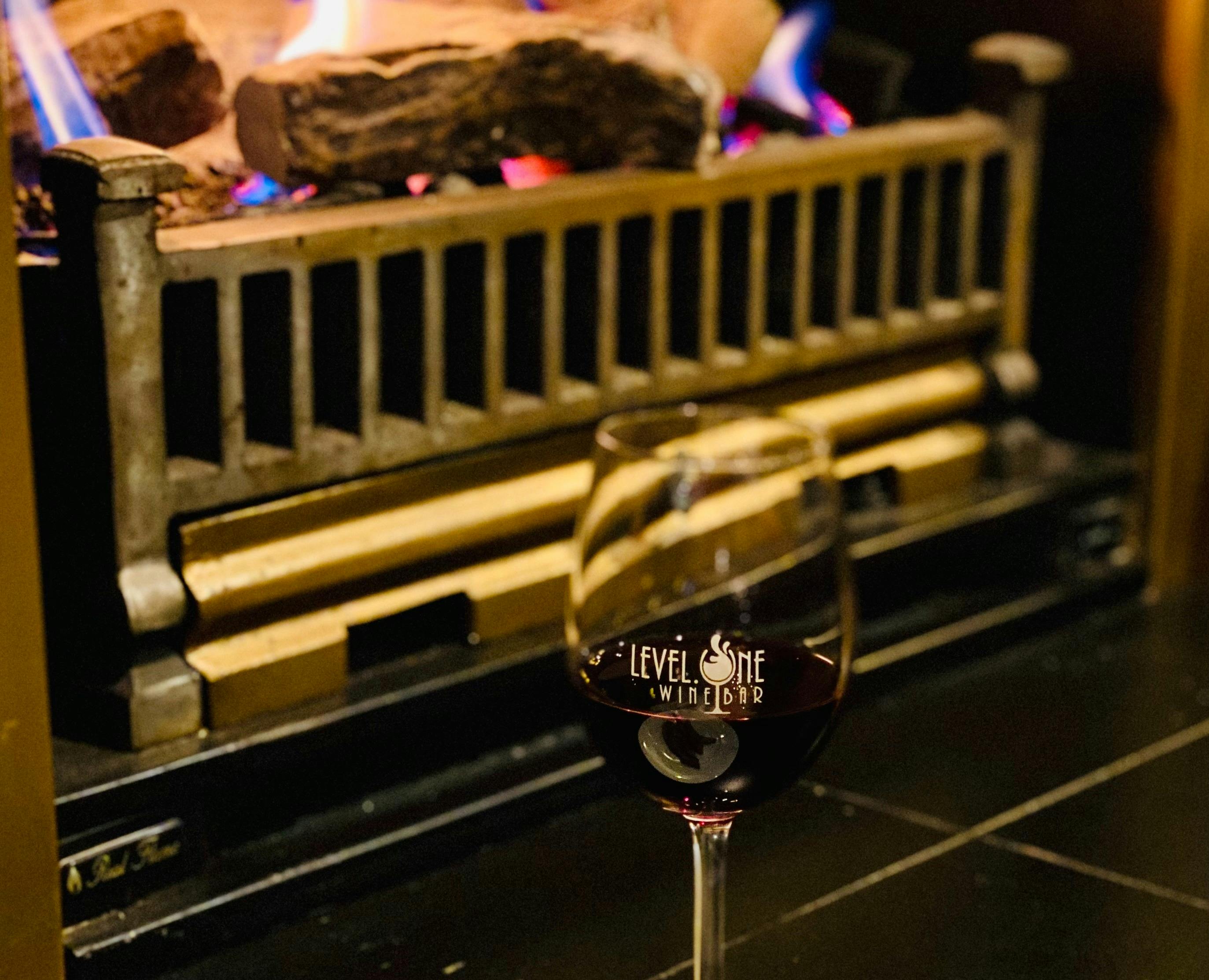 wine glass in front of fire pit