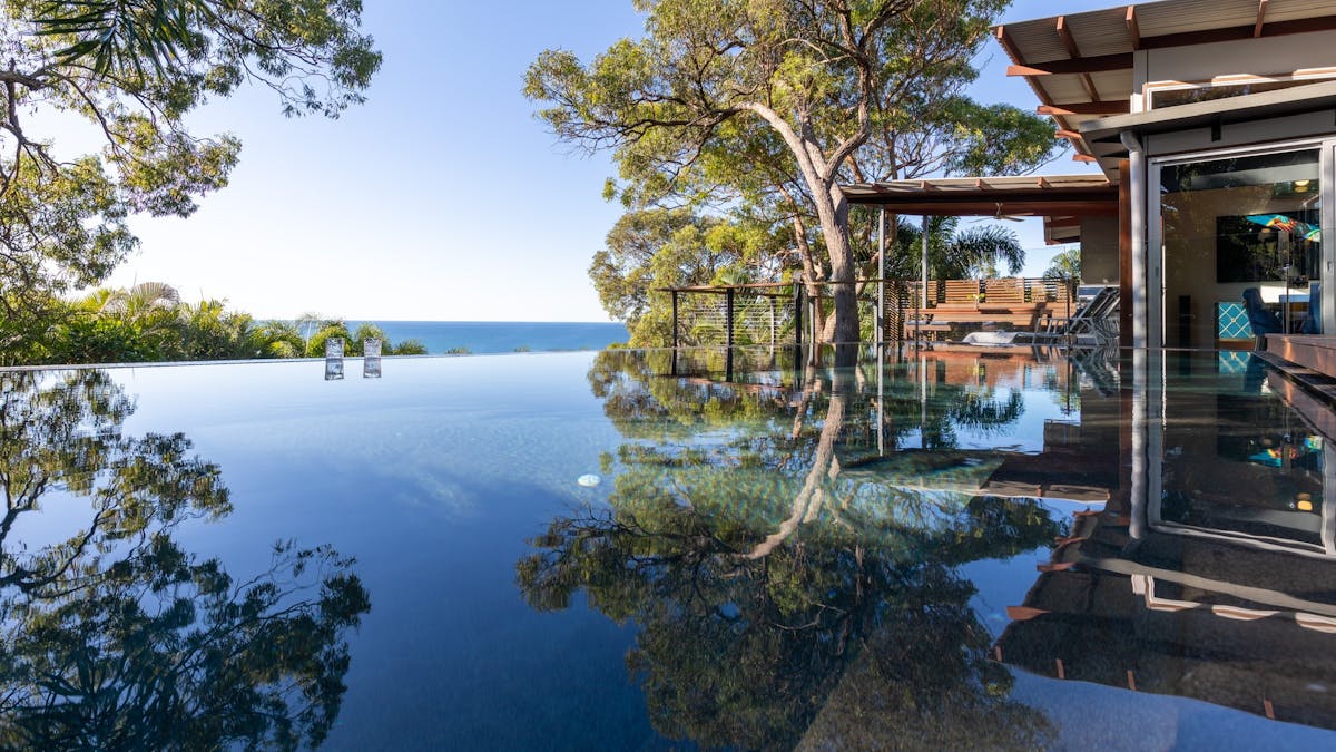 gnes Water. Sleeps 9 across 4 king bedrooms and a single bed.