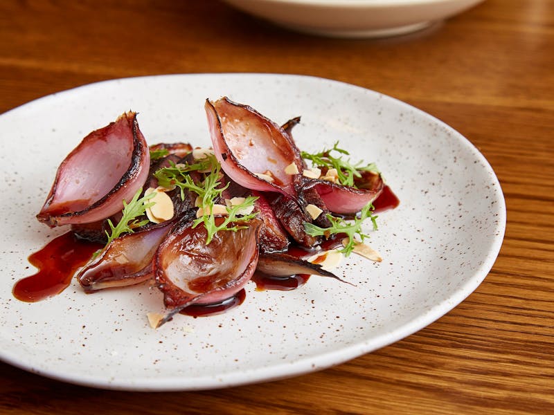 Grilled Mayura Station Wagyu Tri Tip MB 9+, roasted balsamic onions