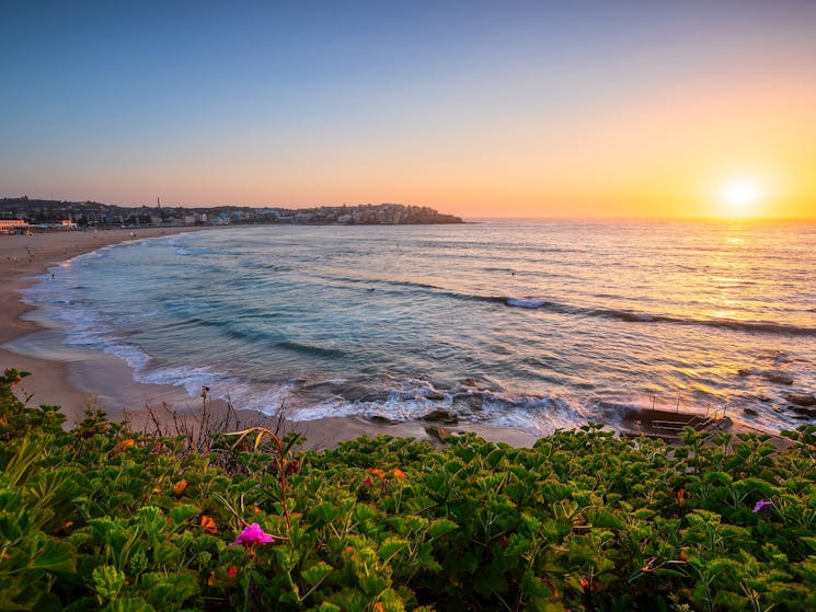 Morning sun rising over Bondi Beach, Sydney