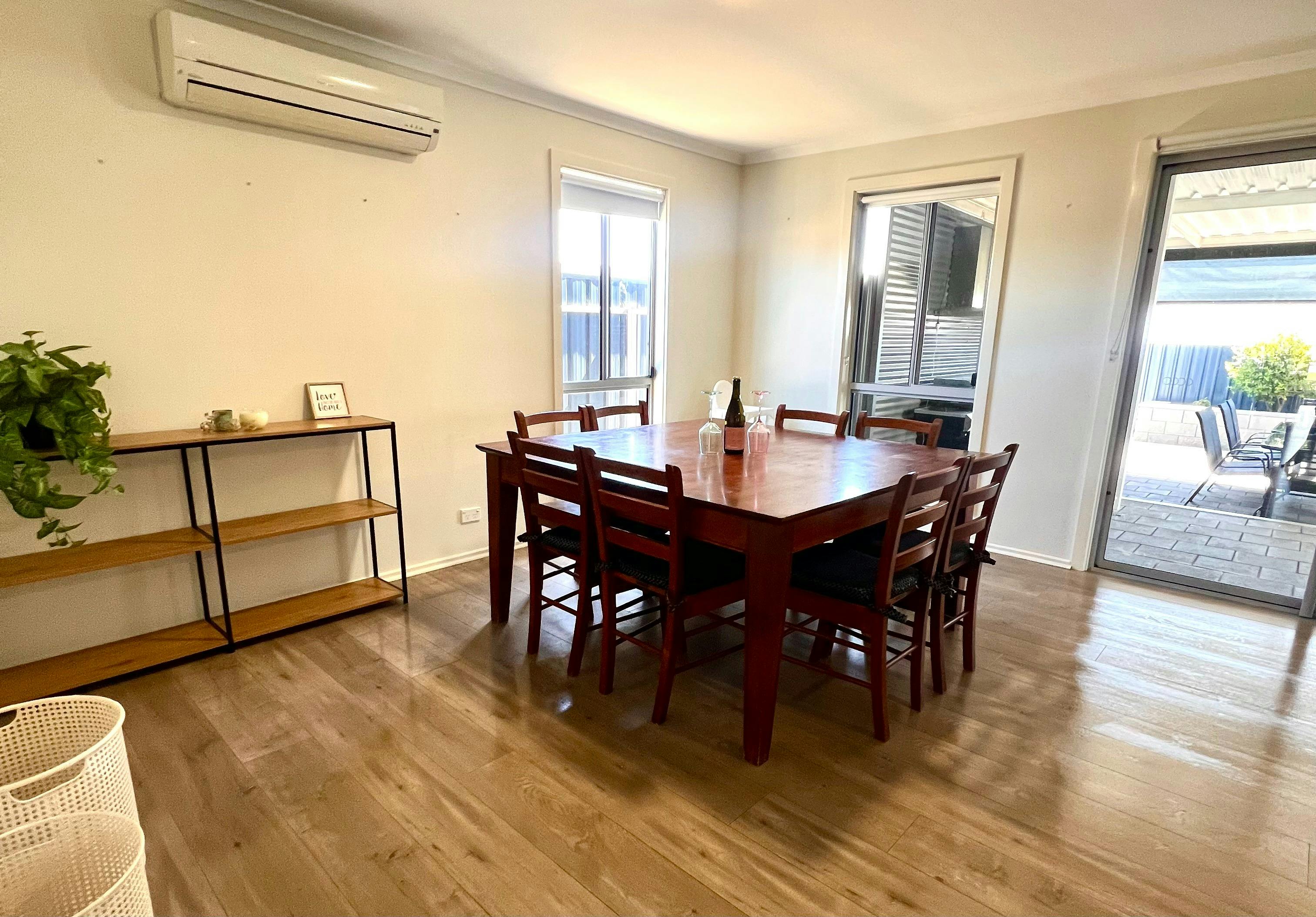 A full-sized dining table provides the perfect setting.