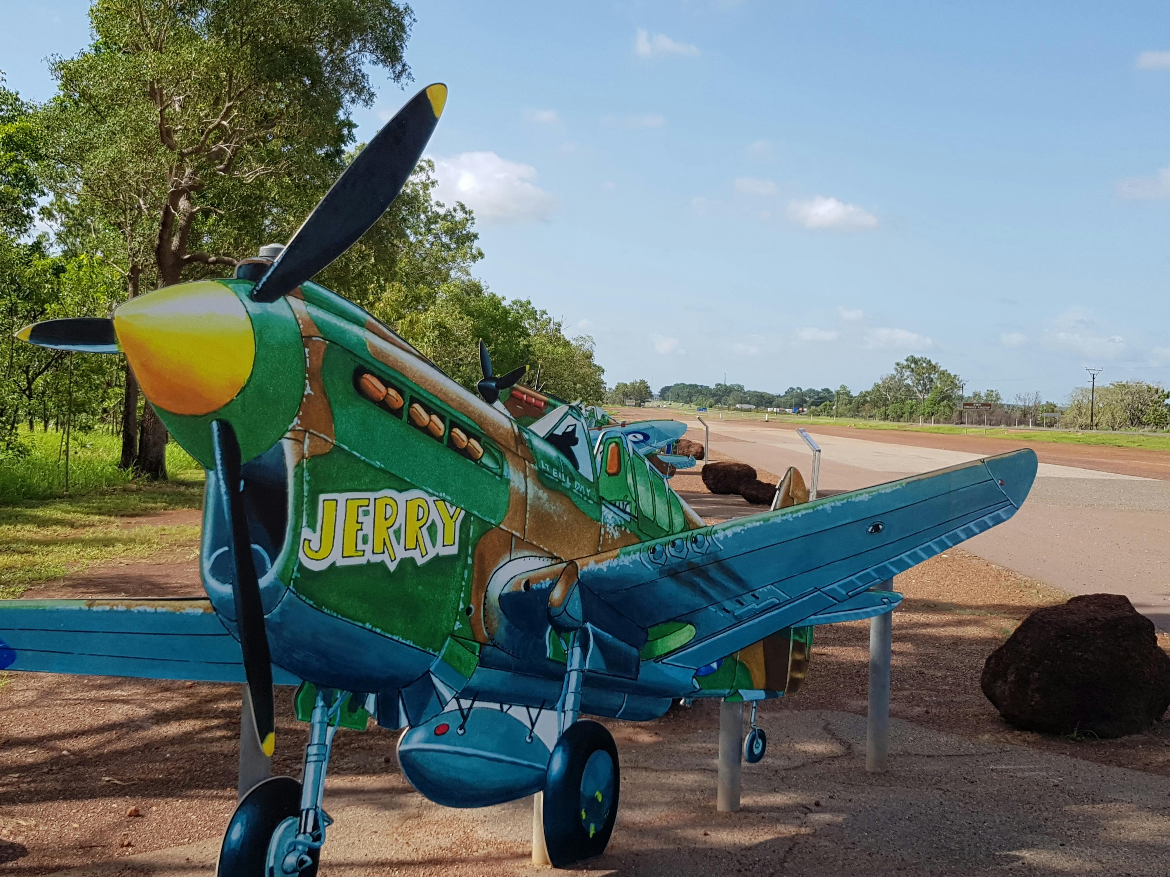 Colourful cutout in the shape of a Spitfire aircraft