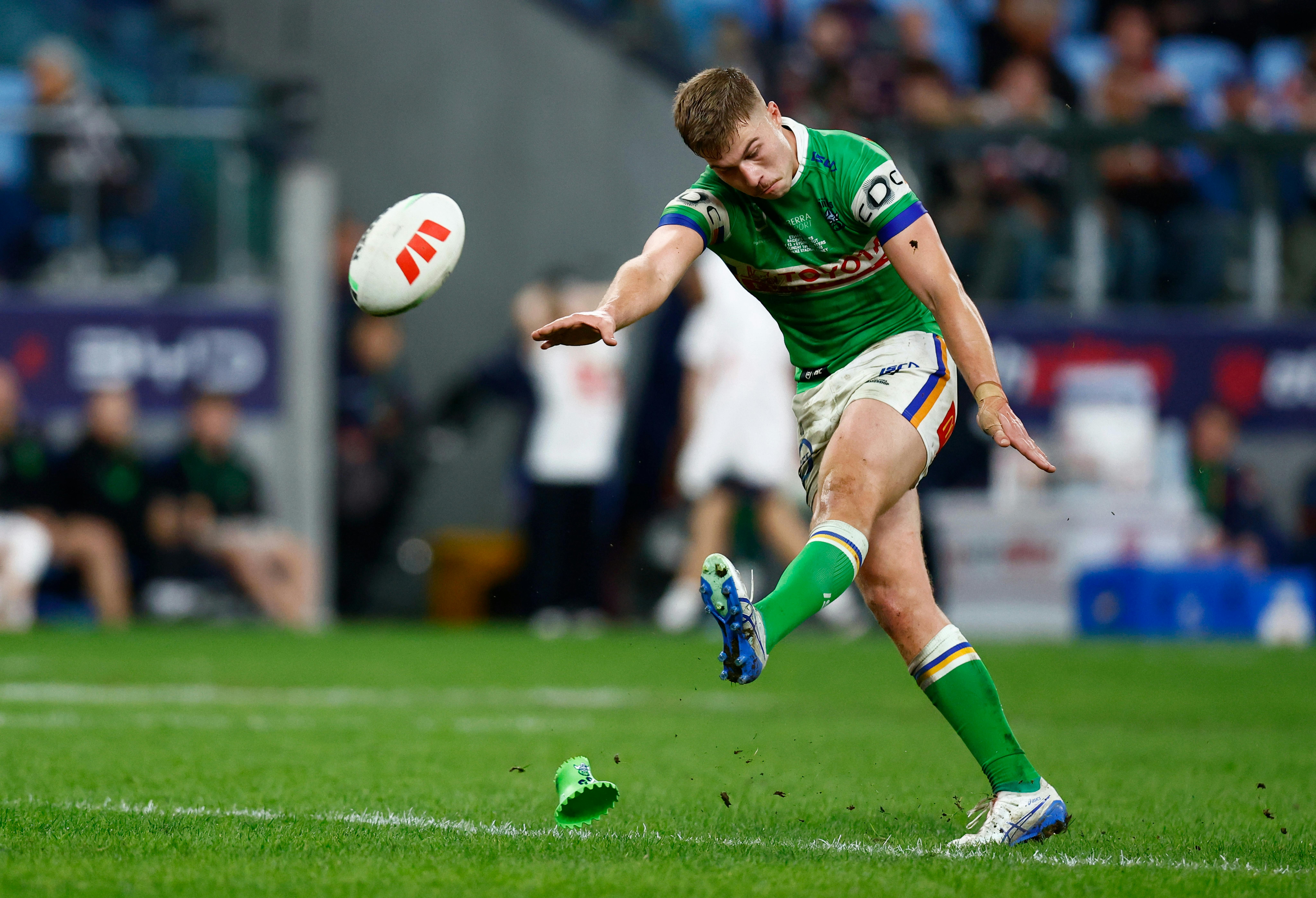 Canberra Raiders player Ethan Sanders kicking a conversion.